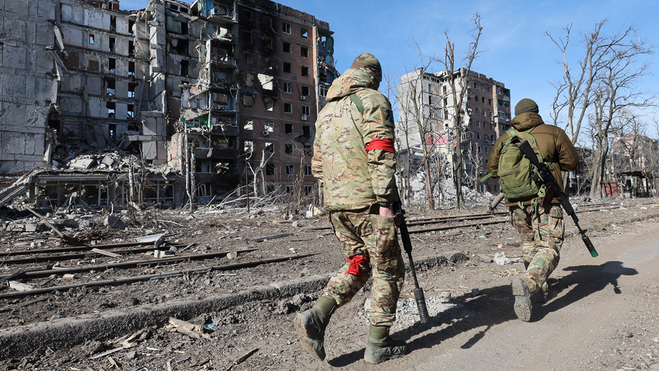 
					Russian soldiers in occupied Avdiivka.					 					Dmitry Yagodkin / TASS 				