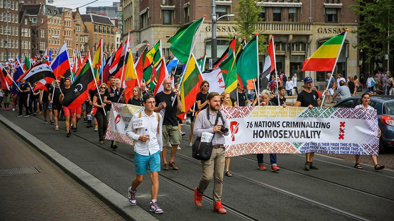 
					Yevgeny Voytsekhovsky and Pavel Stotsko during the Gay Pride parade in Amsterdam on Aug. 4					 					Pavel Stotsko Facebook				