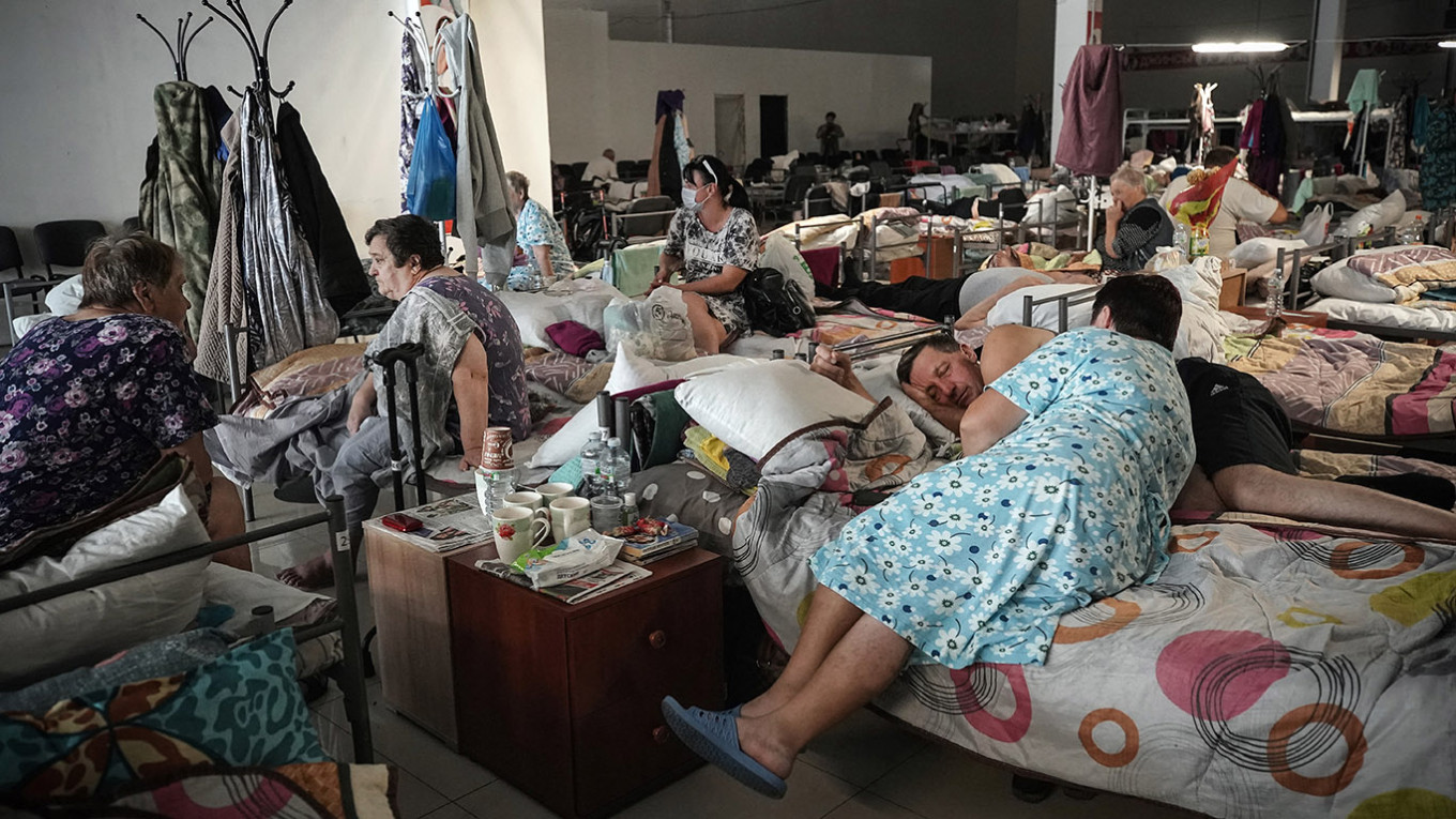 
					Displaced people are seen in a center for displaced people following Ukraine's Kursk region offensive.					 					Tatyana Makeyeva / AFP				