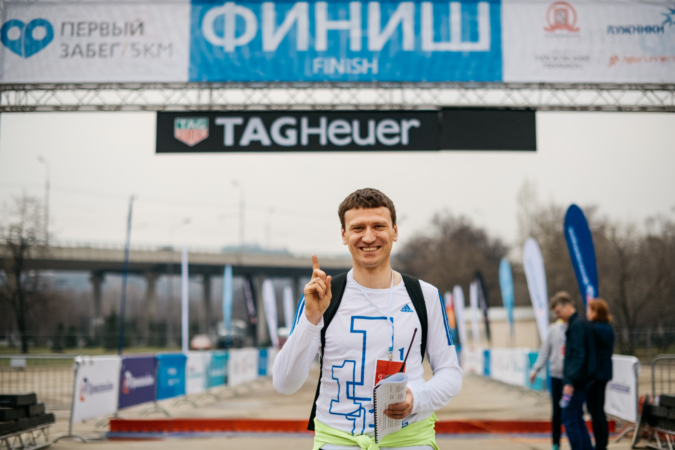 
					Moscow Marathon director Dmitry Tarasov crossing the finish line in style.					 					Courtesy Moscow Marathon				
