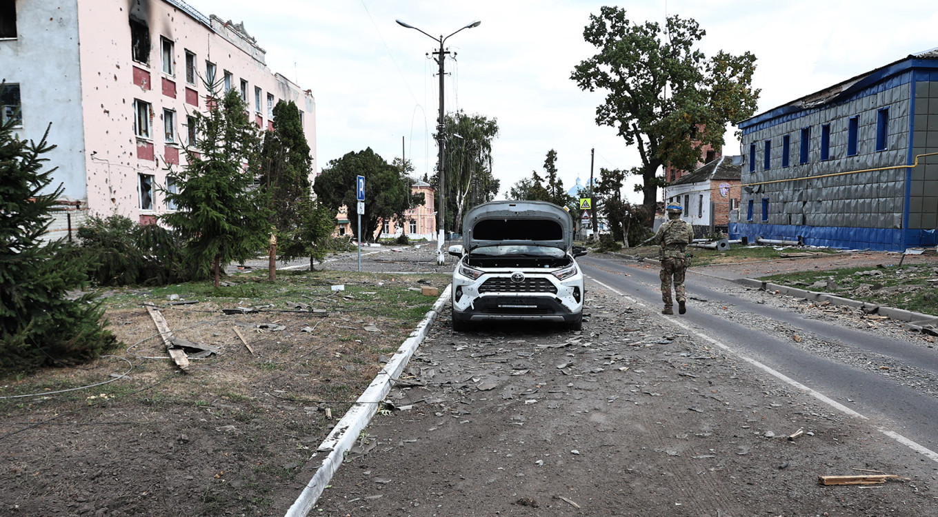 
					A Ukrainian soldier walks along a damaged street in Sudzha, Kursk region.					 					Yan Dobronosov / AFP				