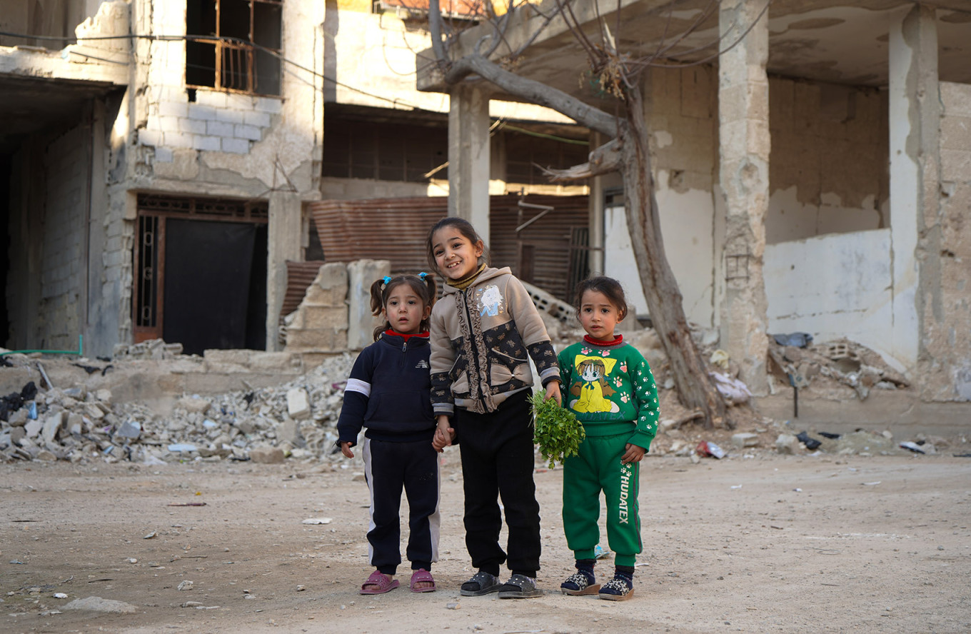 
					Children walking in the street of Arbin, destroyed by the Assad regime with the help of Russian and pro-Iranian forces. Jan. 7, 2025.					 					Iryna Matviyishyn				