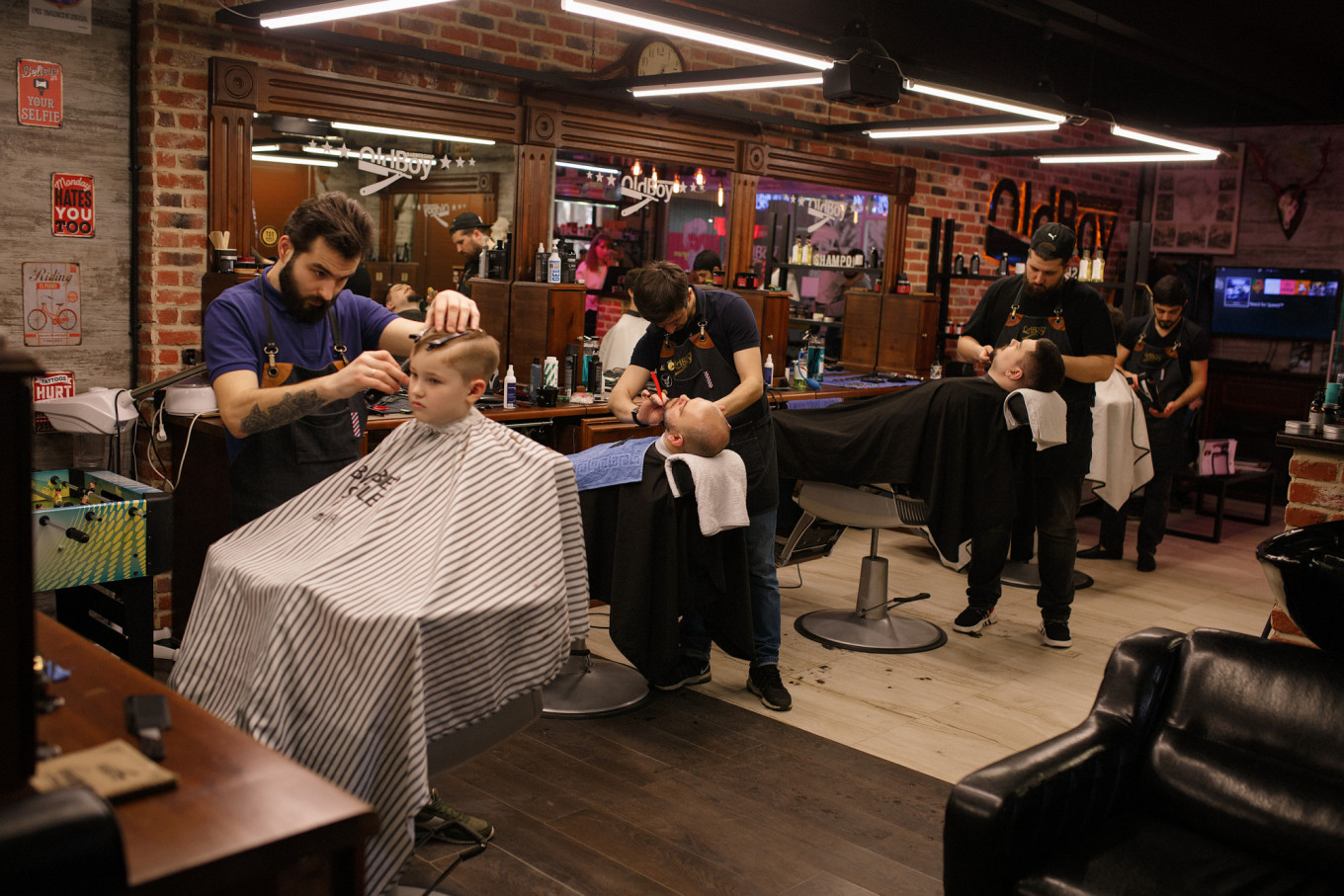 
					Dmitri Porochkin, an entrepreneur who owns four Old Boy barbershop franchises, says business is down around one-quarter already. He also runs two coffee shops, where trade is down 50%. He wants the government to set up a fund to help small business owners make rent payments. Credit: .					 					Dmitri Porochkin				