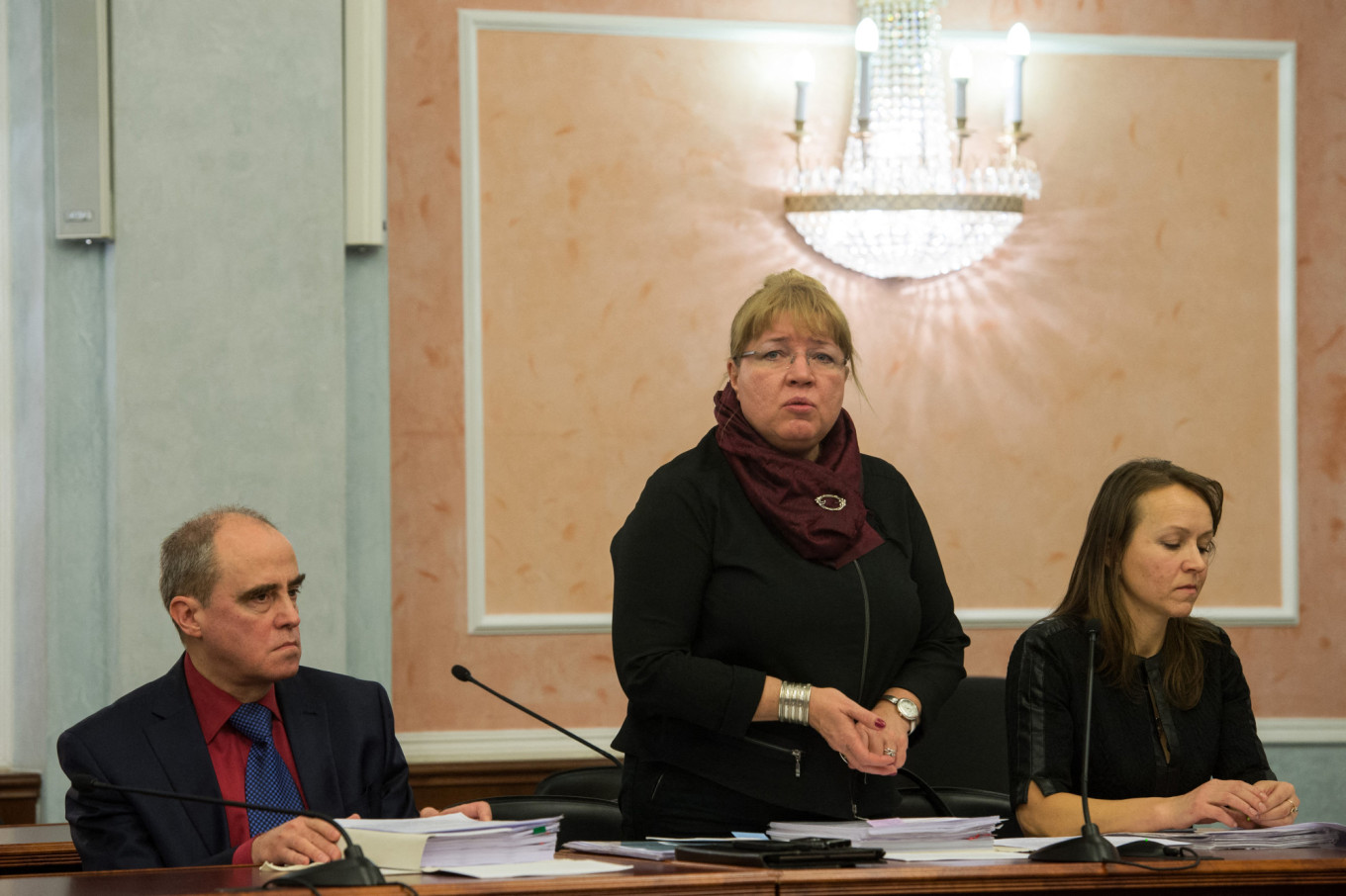 
					Memorial executive director Elena Zhemkova (C) speaks in a courtroom during a hearing on Memorial's closure before the Russian Supreme Court in Moscow, December 2014.					 					Dmitry Sereryako / AFP				