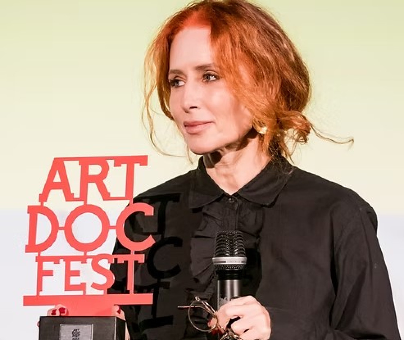 
					Vera Krichevskaya accepting award at Artdocfest.					 					Courtesy of director				