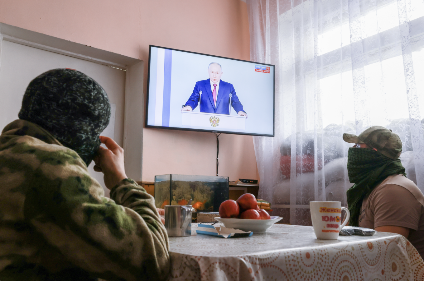 
					Russian soldiers at a military hospital in the occupied Donetsk region watch a speech by Putin.					 					Vladimir Gerdo / TASS				