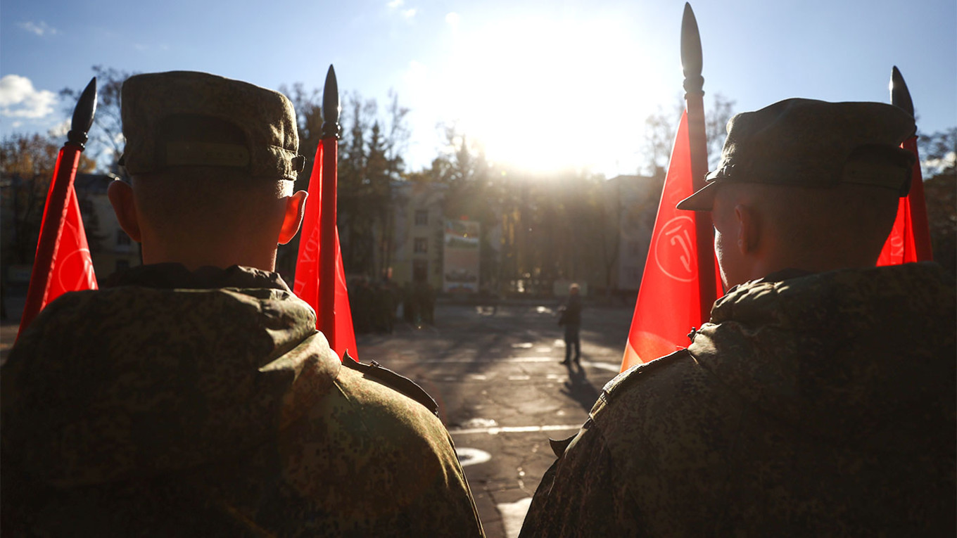 
					Soldiers at a send-off ceremony for mobilized reservists near Moscow.					 					Alexander Shcherbak / TASS				