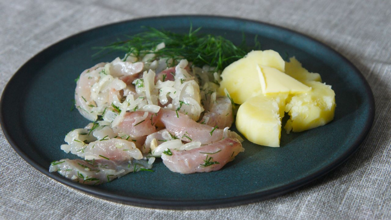 
					Sagudai from freshly salted Yakut nelma — always served with boiled potatoes, butter and dill.					 					Pavel and Olga Syutkin				