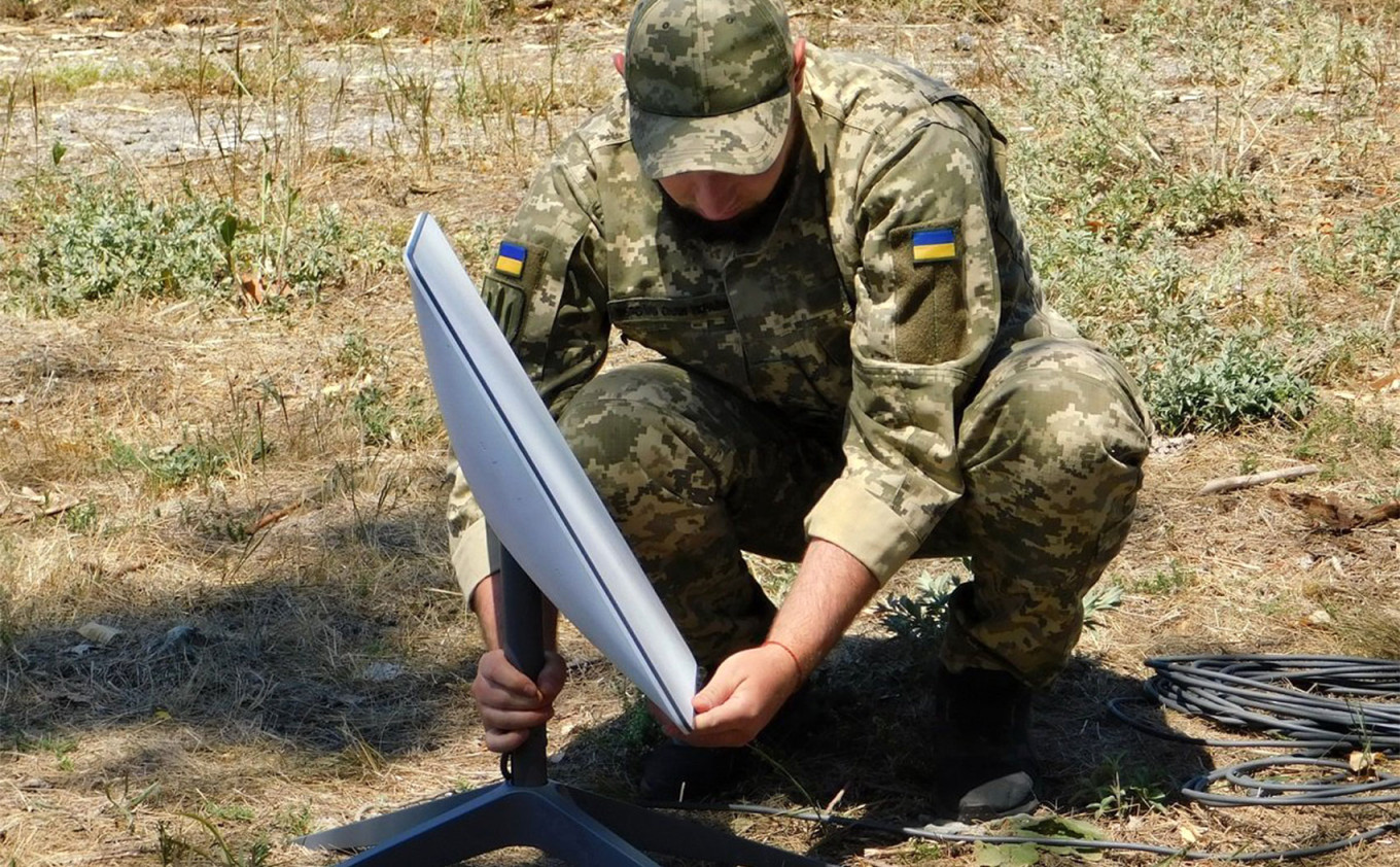 
					A Ukrainian soldier installing a Starlink terminal.					 					Ukrainian Ministry of Defense				