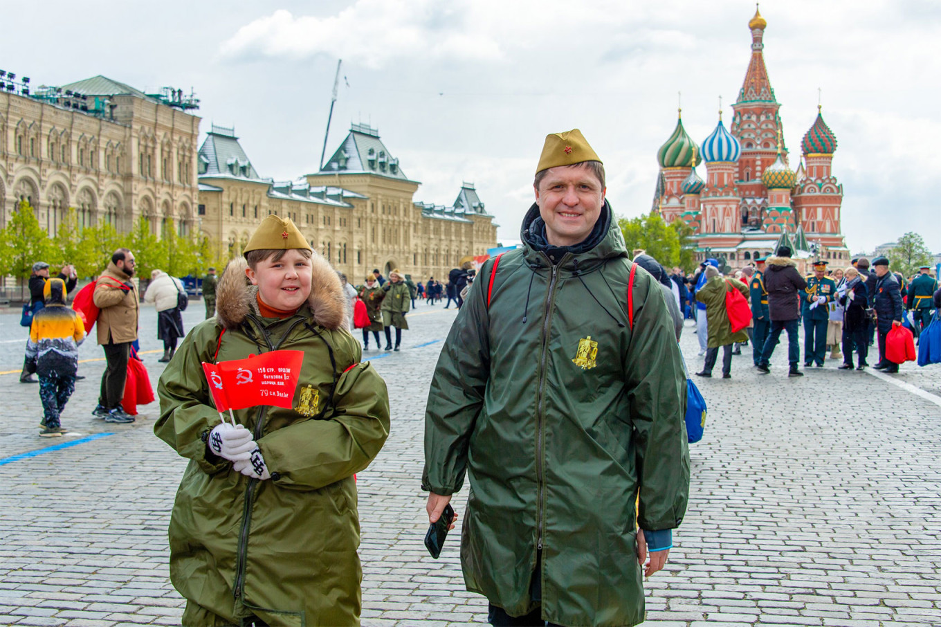 
					People on Red Square in Moscow after a military parade.					 					Moskva News Agency				