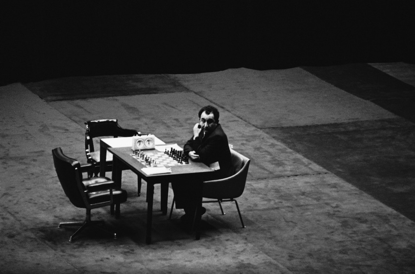 
					Tigran Petrosian, of the Soviet Union, sits at the chess board and waits for Bobby Fischer on Oct. 14, 1971.					 					Domingo Zenteno / AP				