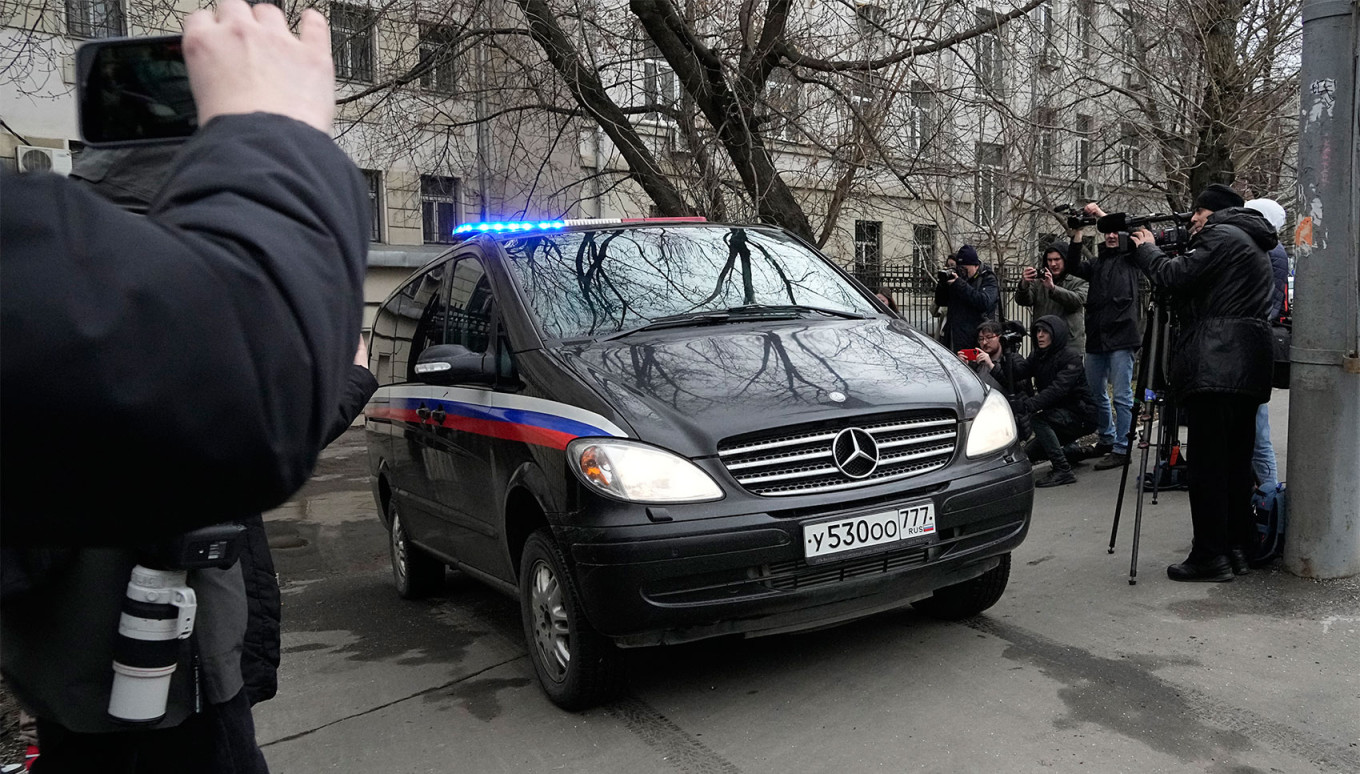 A van carrying Gershkovich leaves Lefortovo court in Moscow. Alexander Zemlianichenko / AP / TASS