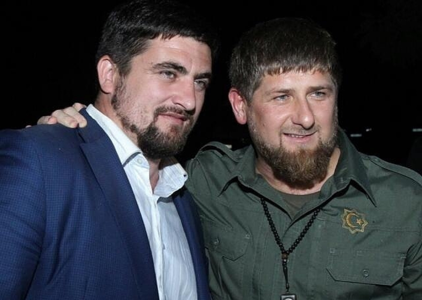 
					Beslan Terekbayev (on the left) says that with Kadyrov’s help they “will seize the world.”					 					ChechenFilm				