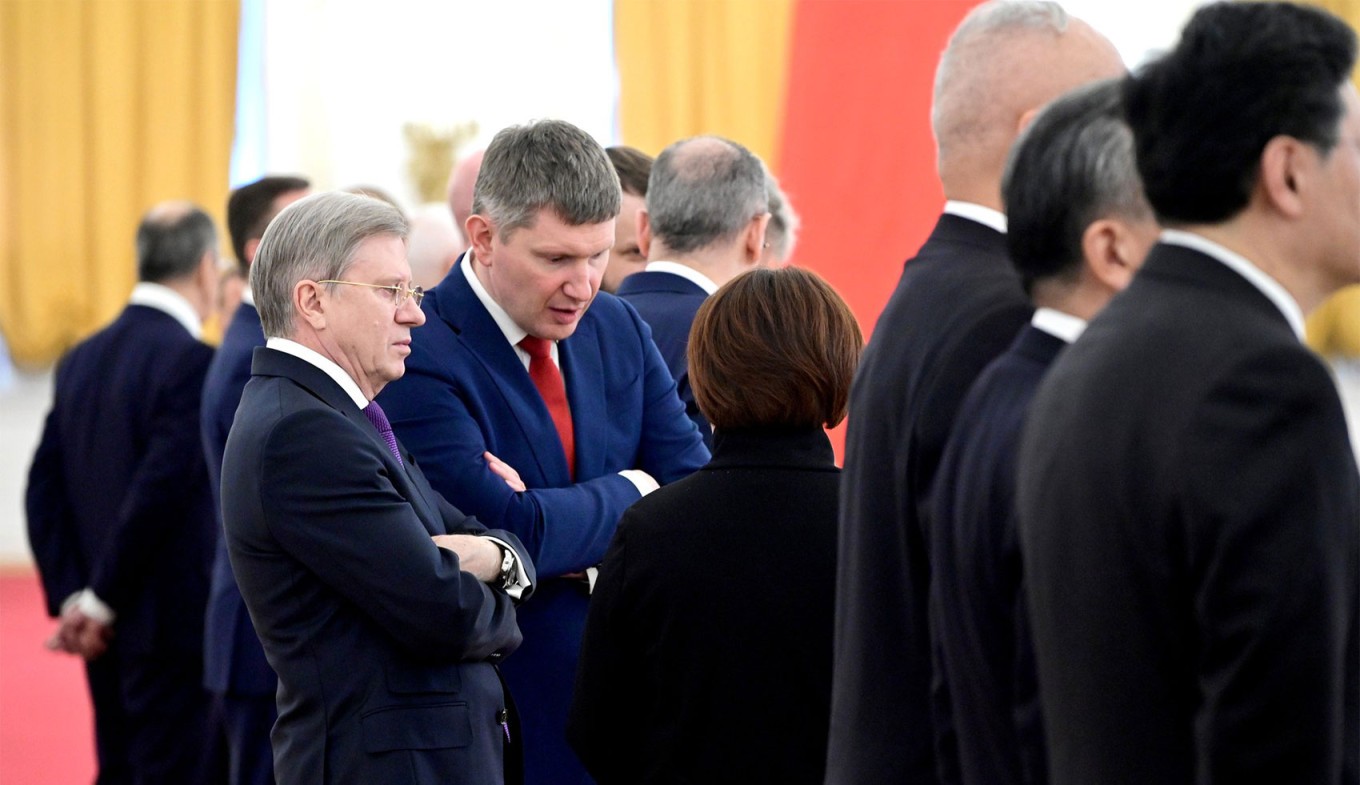 
					Transport Minister Vitaly Savelyev (L) and Minister of Economic Development Maxim Reshetnikov.					 					kremlin.ru				