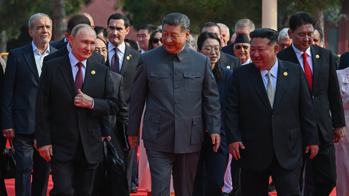 Vladimir Putin, Xi Jinping and Kim Jong Un. kremlin.ru