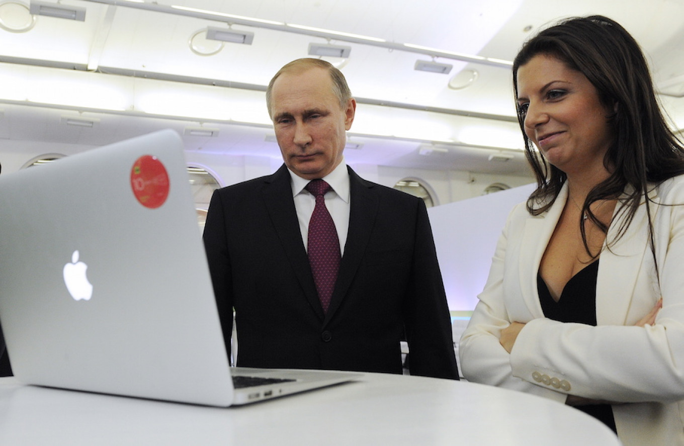 
					Editor-in-chief Margarita Simonyan (R) has defended RT against French President Macron’s blunt characterization of the channel as “lying propaganda.”					 					Mikhail Klimentyev / TASS				