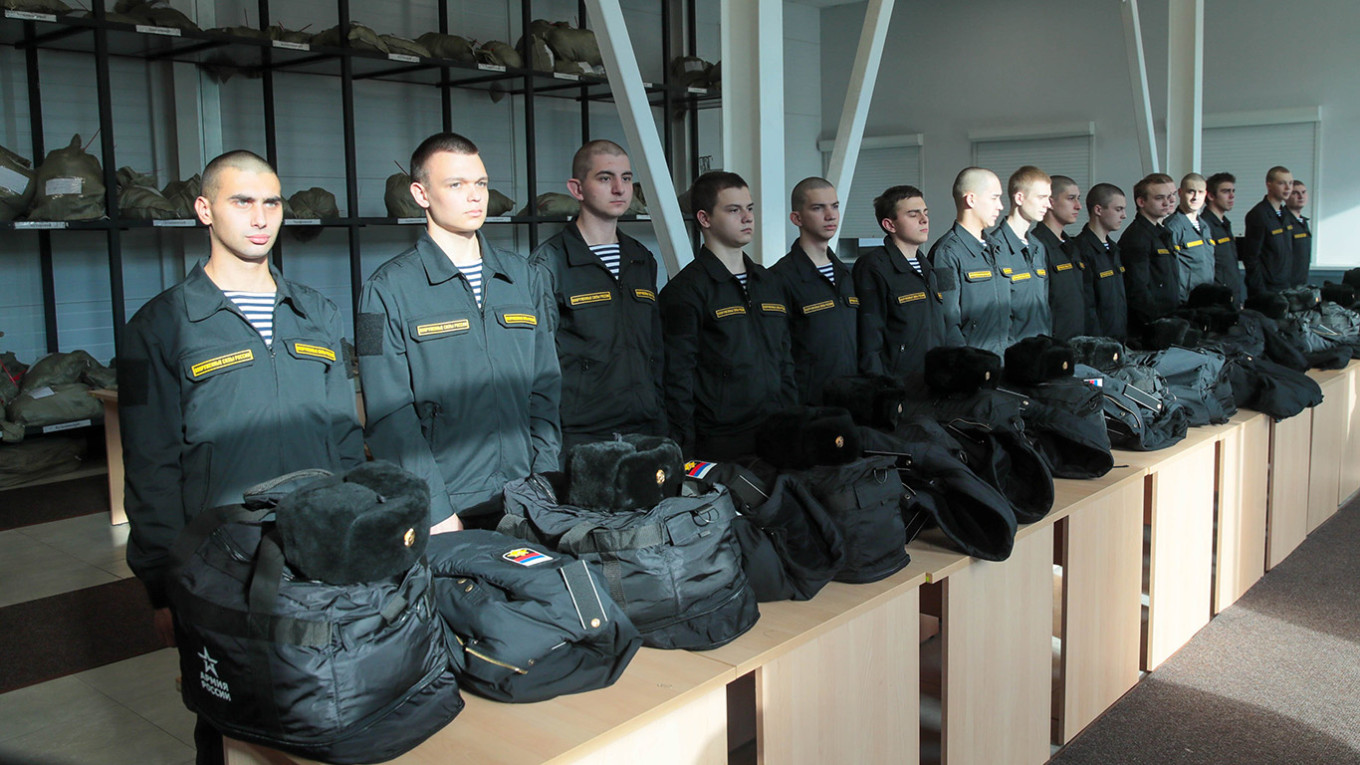 
					Russian conscripts at a military enlistment office in Moscow.					 					Vasily Kuzmichenok / Moskva News Agency    				