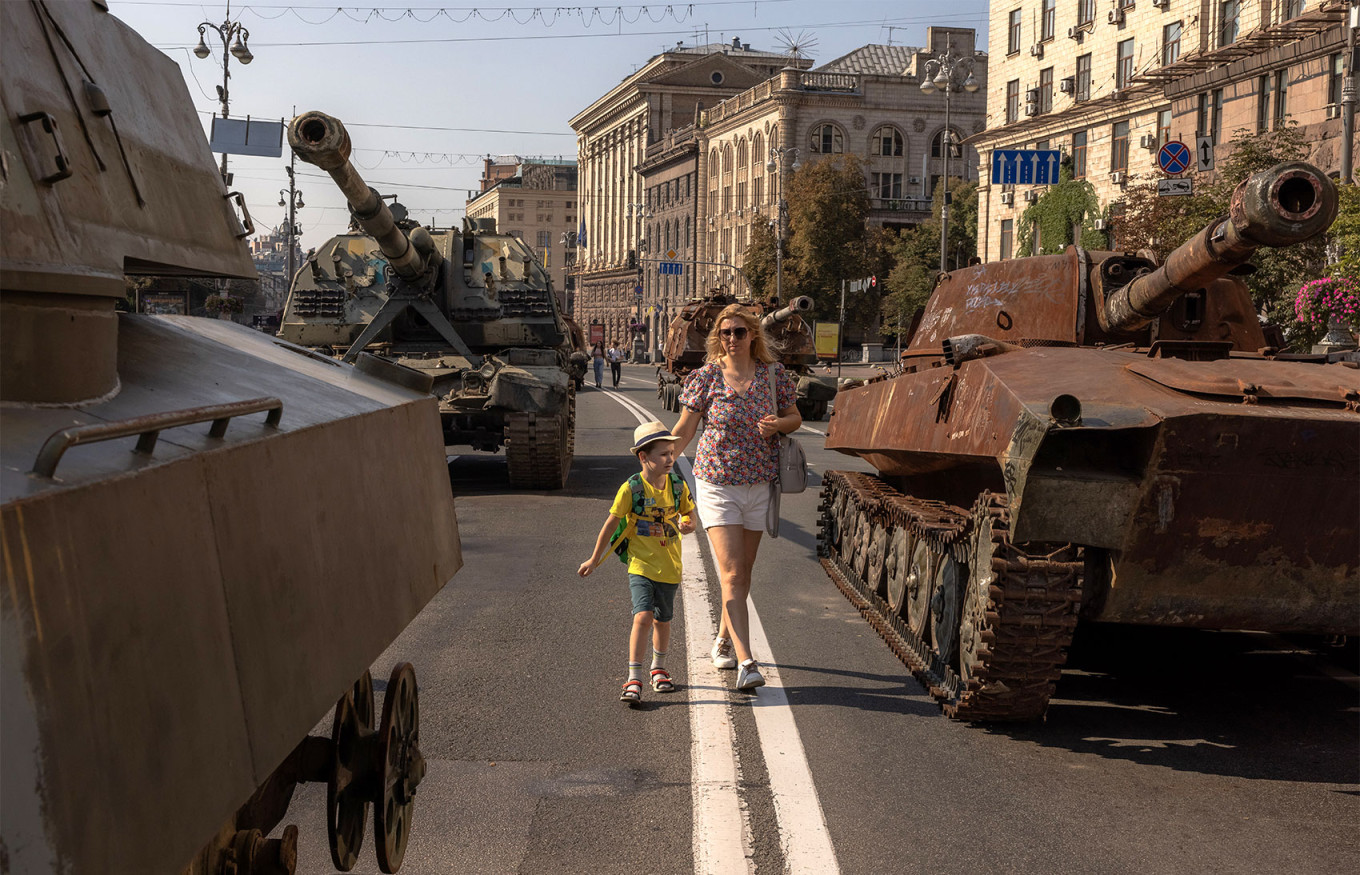 In Photos: Ukraine Displays Destroyed Russian Tanks, Marks National Flag  Day - The Moscow Times
