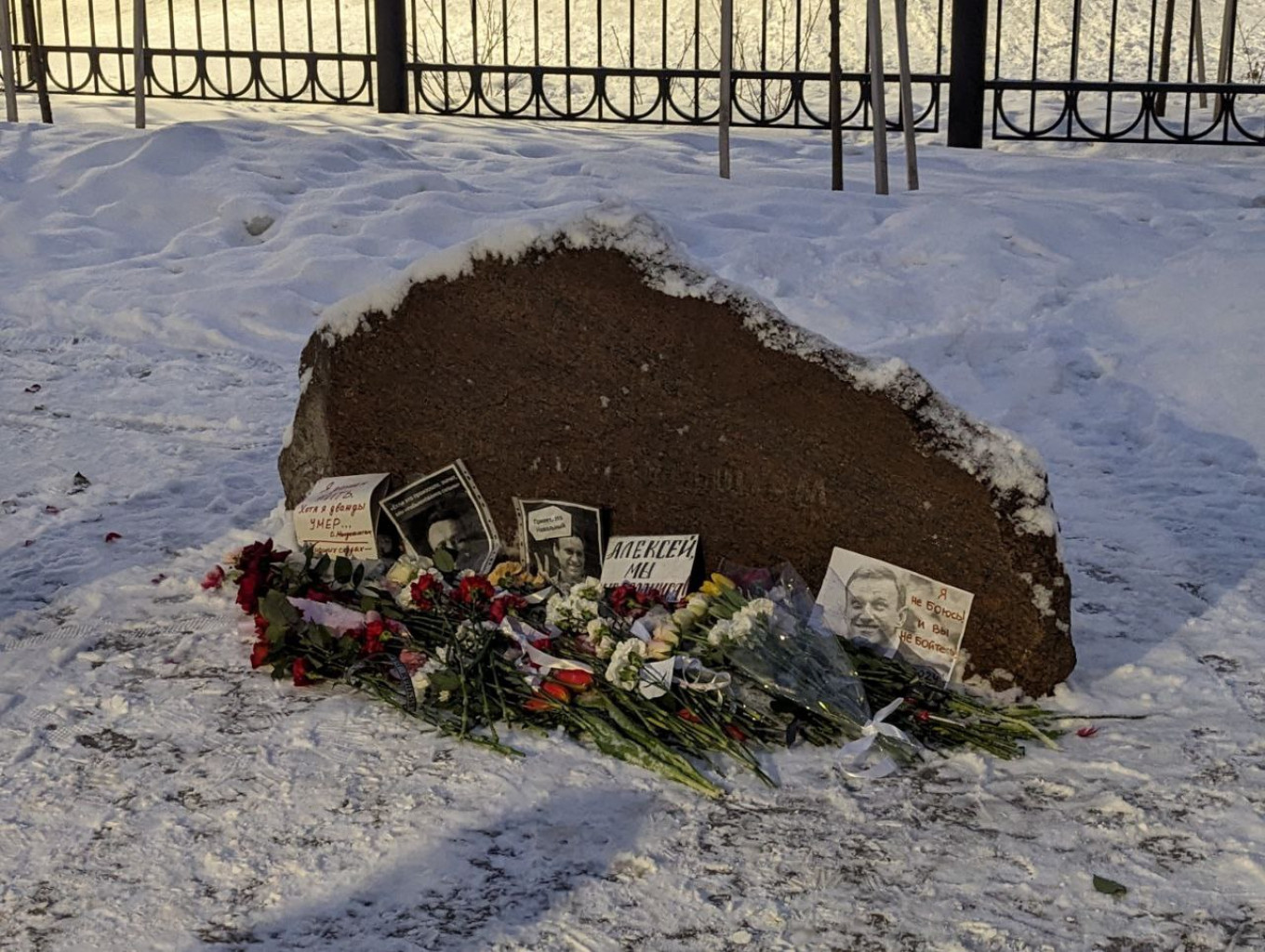 
					The makeshift memorial for Navalny at the monument to Osip Mandelshtam.					 					Moscow Times Reporter				