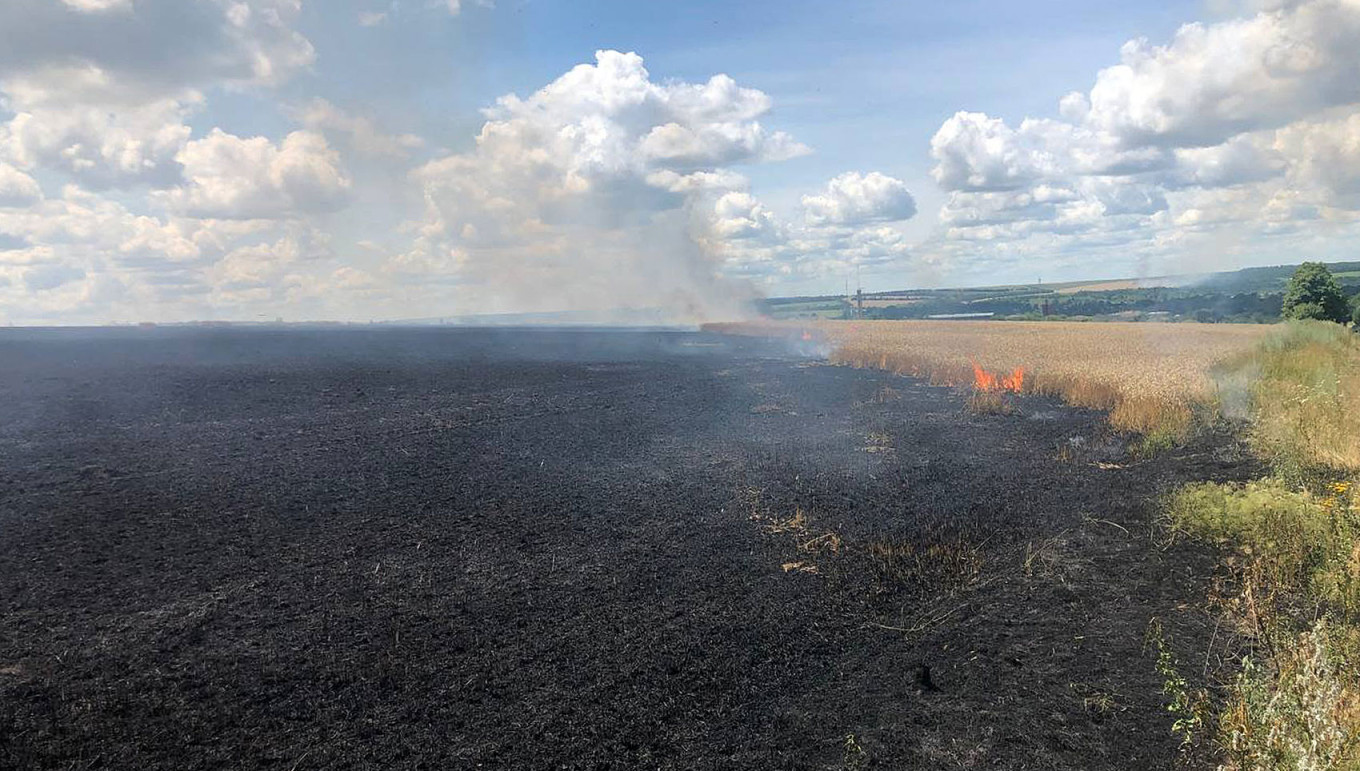 In Photos: Ukraine Saves Wheat Fields Endangered by Russian Offensive ...