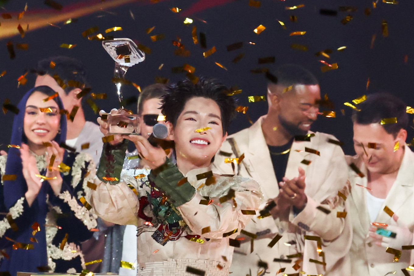 
					Vietnam's contestant Duc Phuc holds up the Intervision trophy.					 					Sergei Fadeichev / TASS				