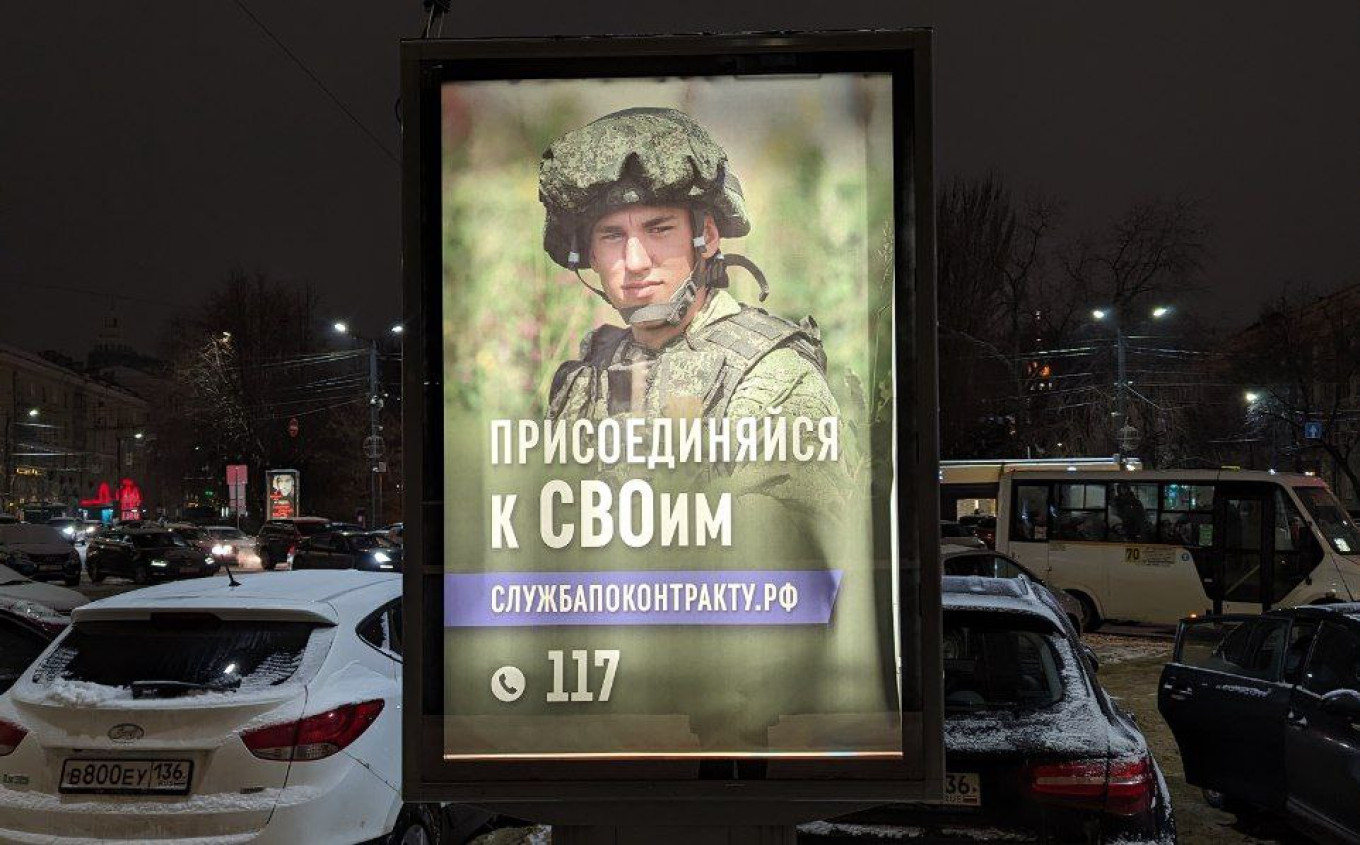 
					A contract military service recruitment advertisement in Voronezh.					 					Moscow Times Reporter				