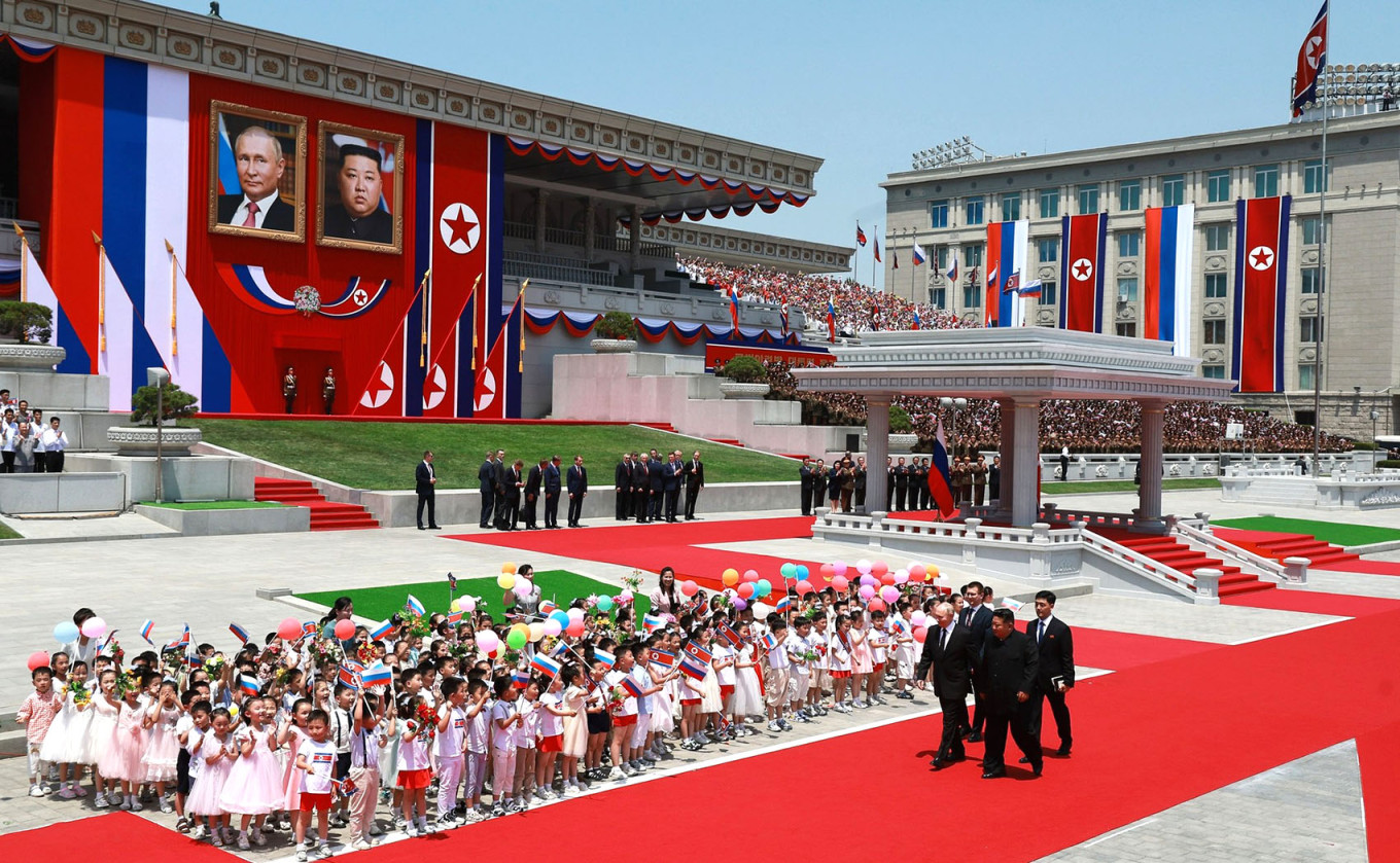 In Photos: North Korea Rolls Out the Red Carpet for Vladimir Putin