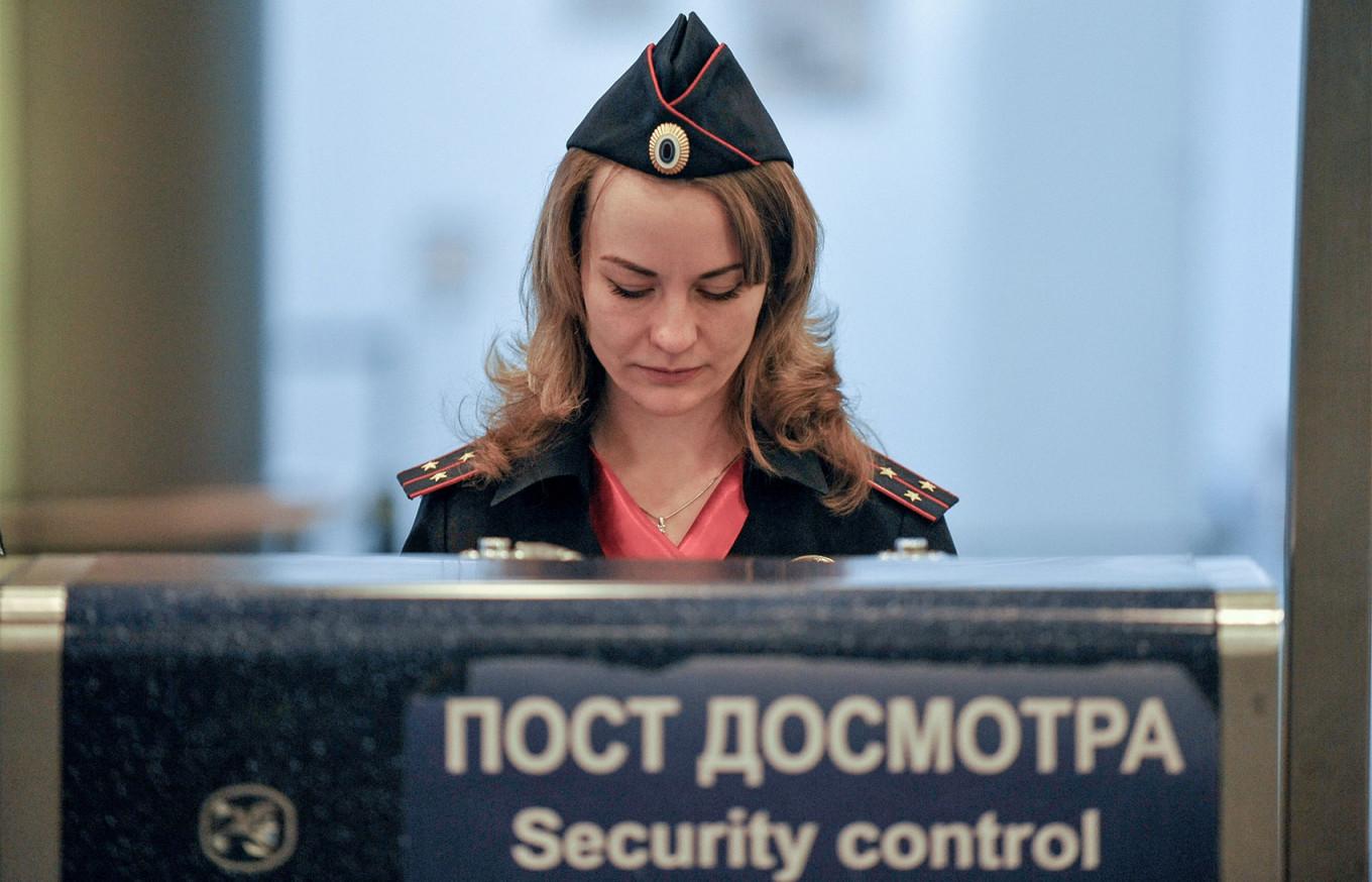 
					Police at Moscow's Vnukovo Airport.					 					Alexander Avilov / Moskva News Agency				