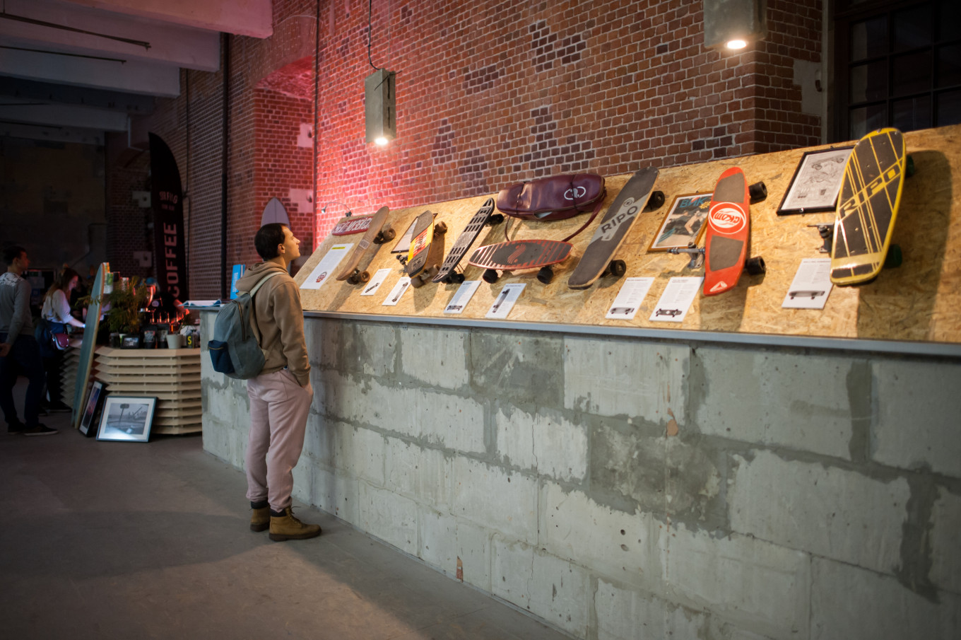 
					A visitor checks out some of the first skateboards used in the U.S.S.R.					 					Courtesy of the Museum of Moscow.				