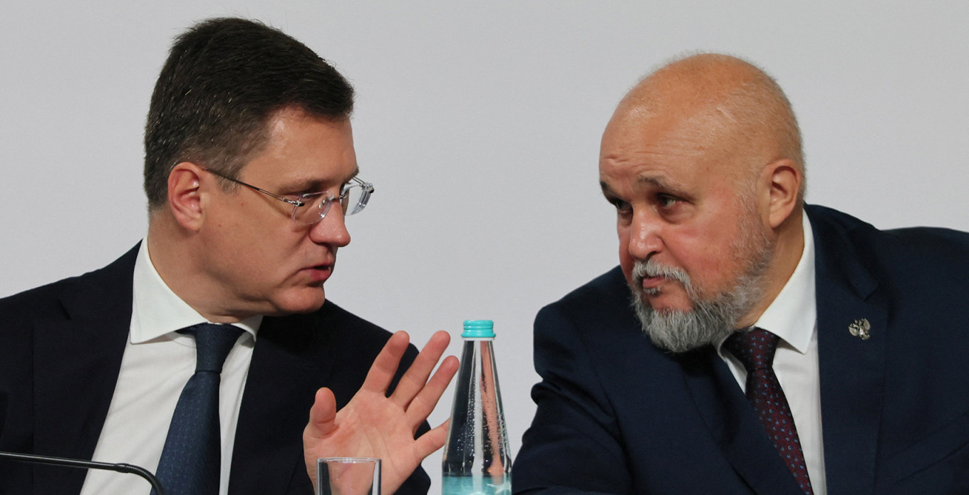 
					Russia's Deputy Prime Minister Alexander Novak and Energy Minister Sergei Tsivilyov at the Russian Energy Week forum in Moscow.					 					REUTERS / Anastasia Barashkova				