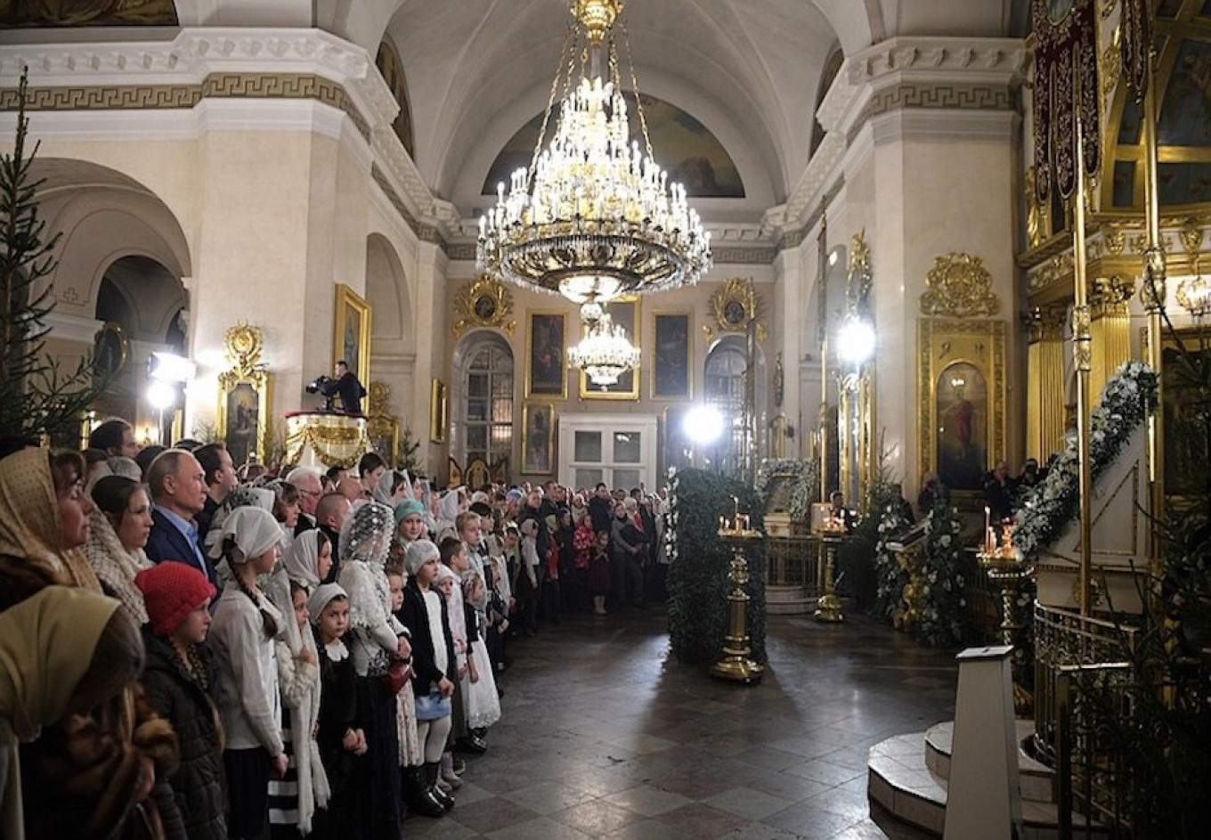 
					A view of the Transfiguration Cathedral in St. Petersburg during midnight mass. 					 					Kremlin.ru				