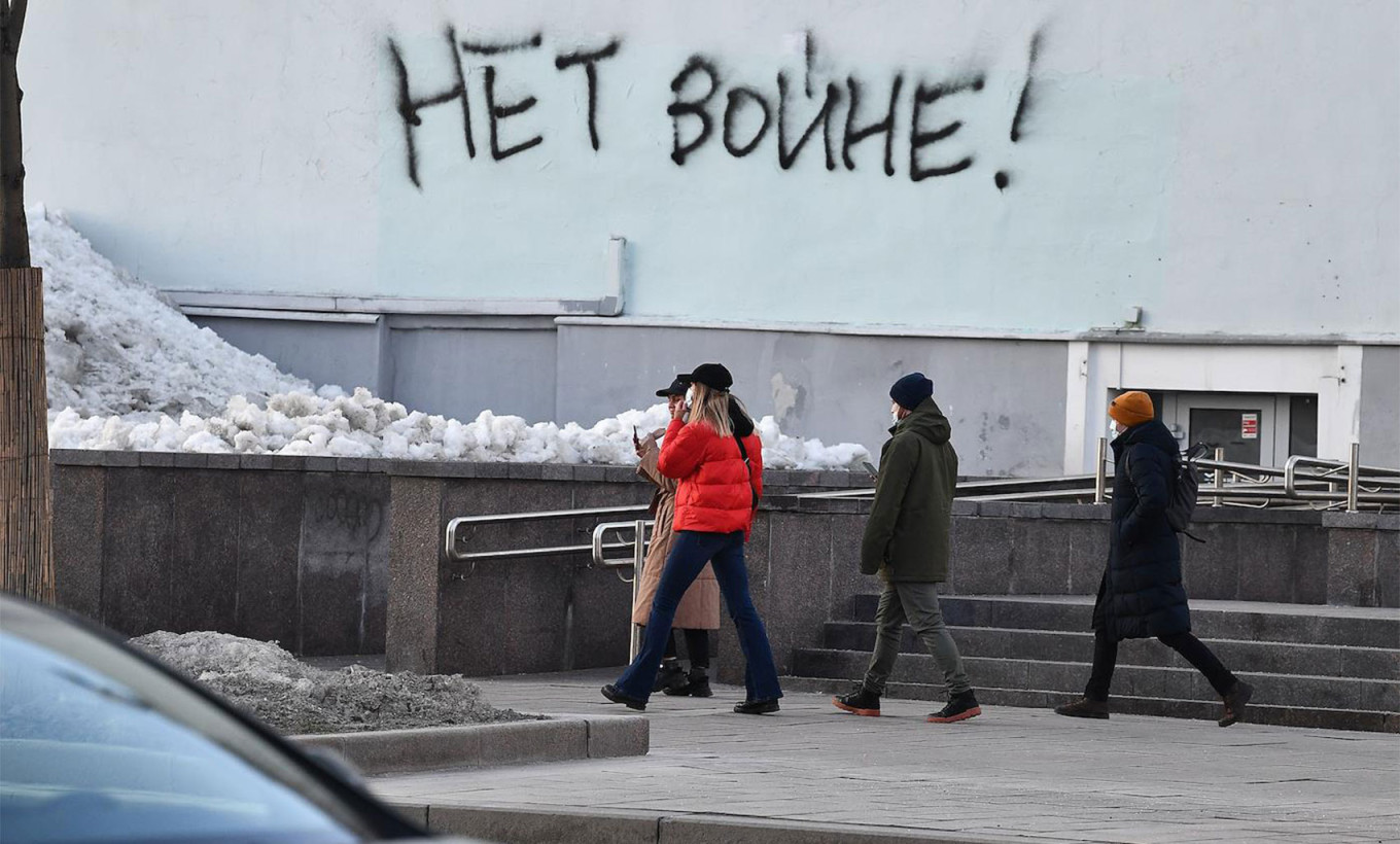 
					"No War!" graffiti on the wall of a house in Moscow.					 					Alexander Miridonov / Kommersant				