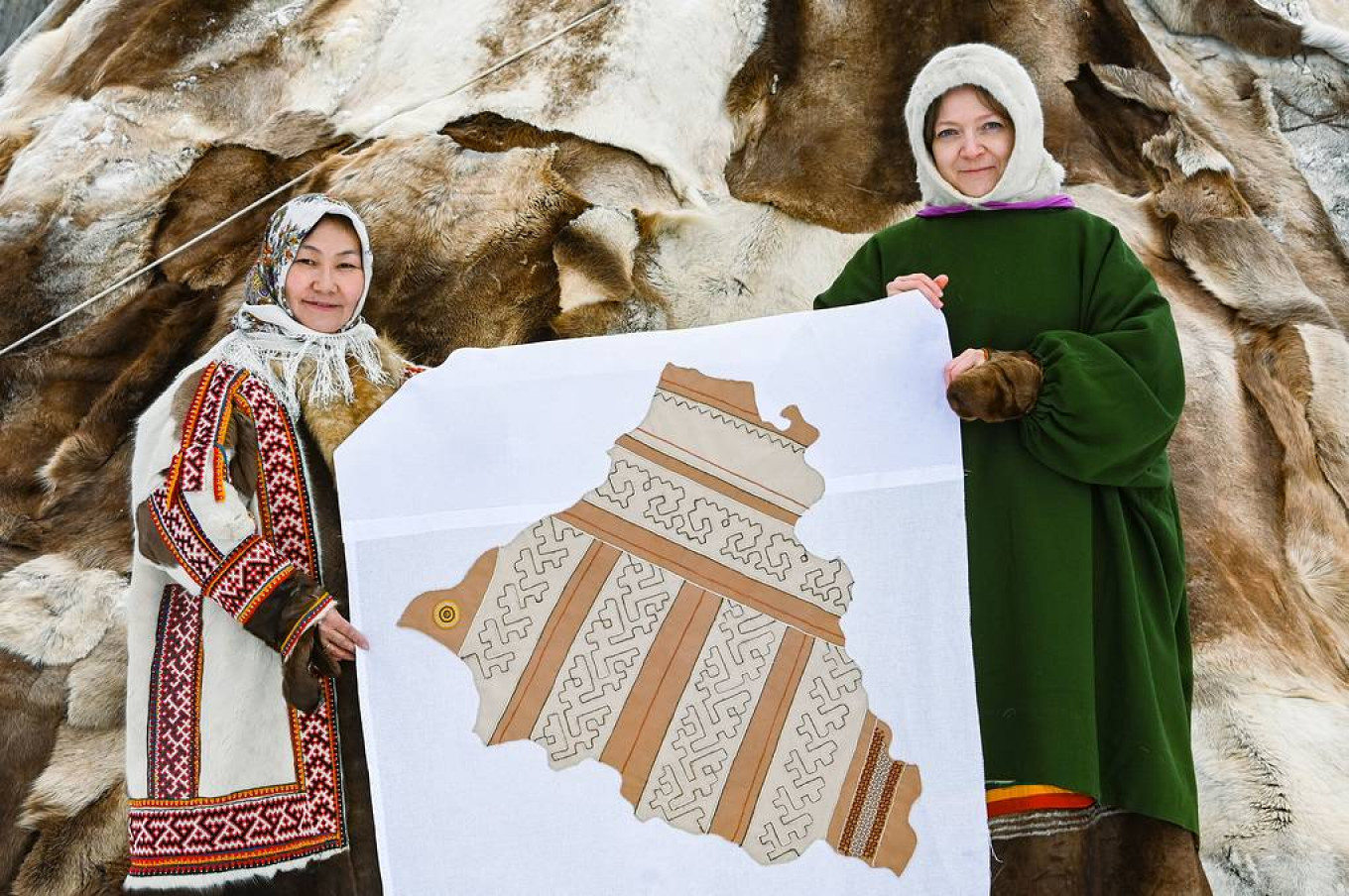 Artists Roza Nakova and Yevgenia Maklakova with the Yamal-Nenets Autonomous District segment.  Yamal-Nenets Autonomous District Governor Press Service