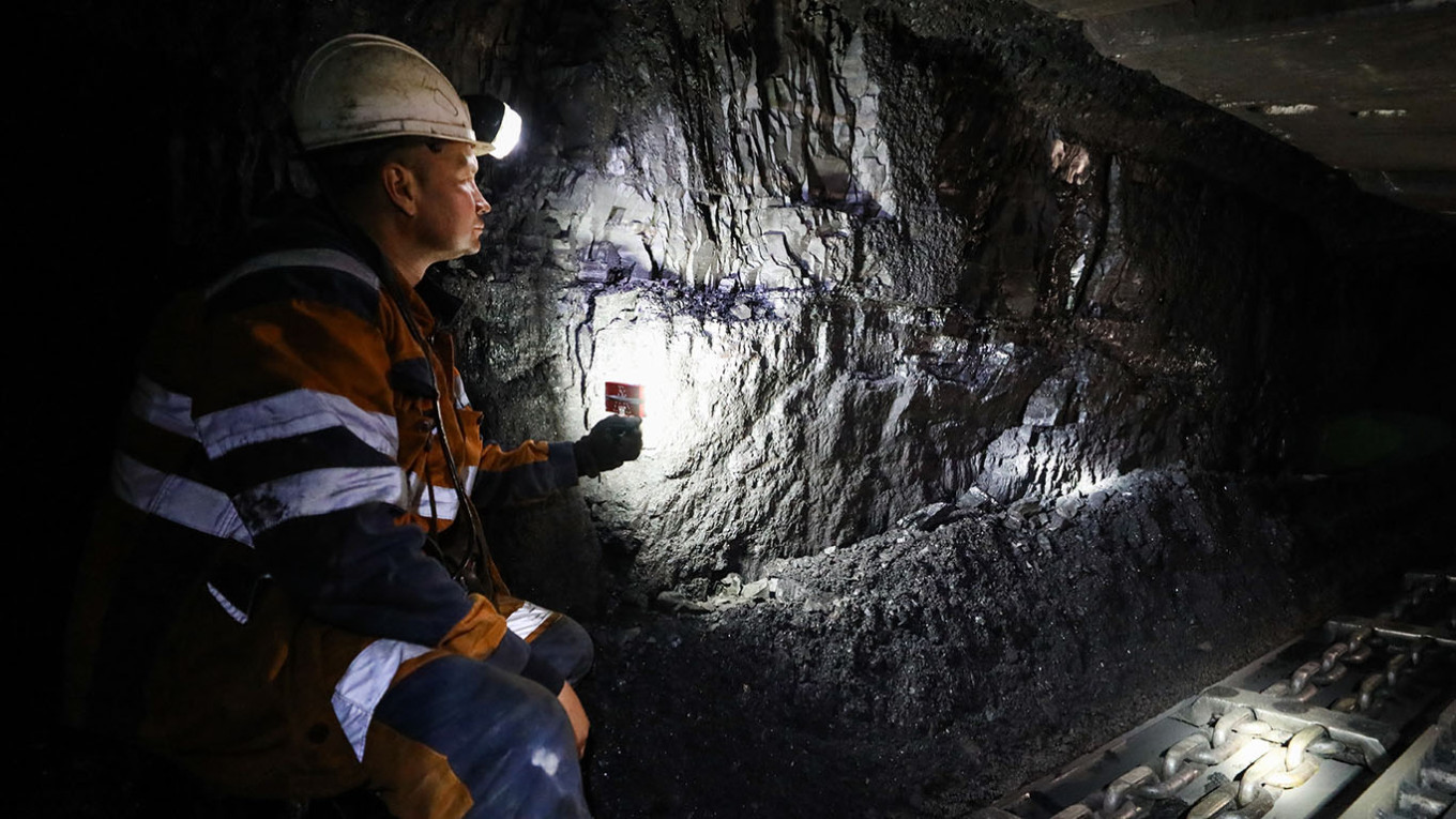 
					An employee is at work at the Vorkutinskaya mine of VorkutaUgol in the town of Vorkuta, north of the Arctic Circle.					 					Mikhail Klimentyev / TASS				