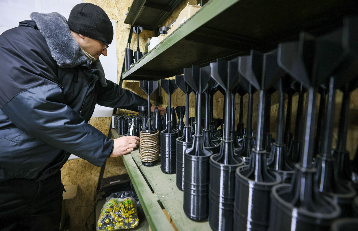 
					Production of ammunition for UAVs of the West Group of the Russian Armed Forces. 					 					Alexander Reka / TASS 				