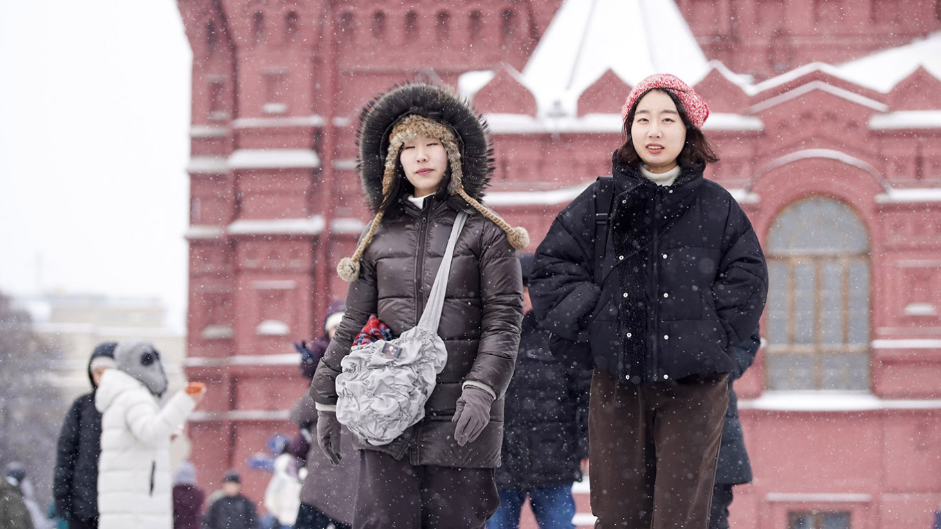 
					Chinese tourists in Moscow.					 					Alexander Avilov / Moskva News Agency				