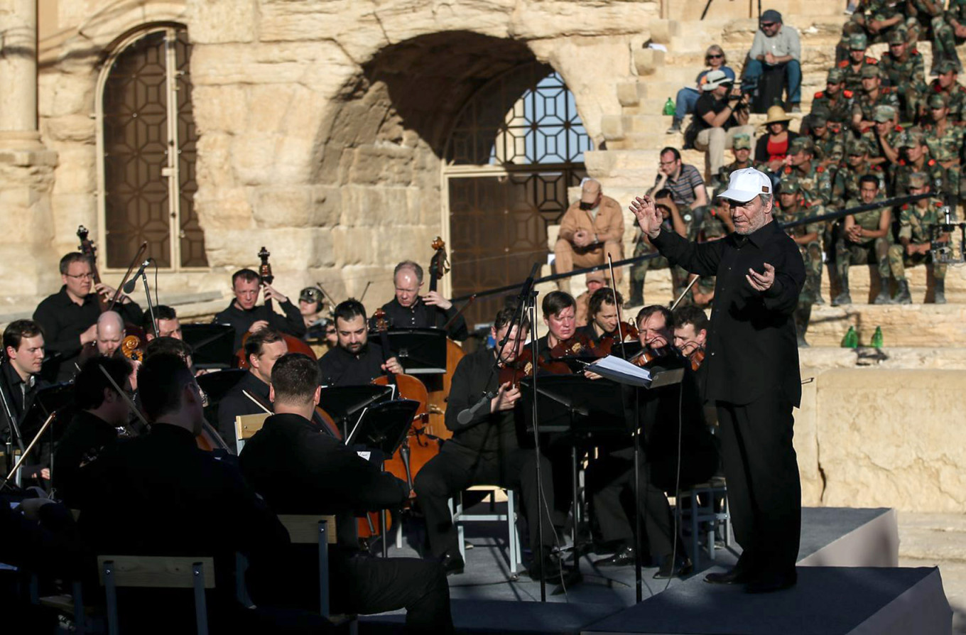 
					Conductor Valery Gergiyev (R front) and Mariinsky Theatre Symphony Orchestra perform a concert at the ancient Roman amphitheatre in the town of Palmyra in 2016. 					 					Anton Novoderezhkin / TASS 				