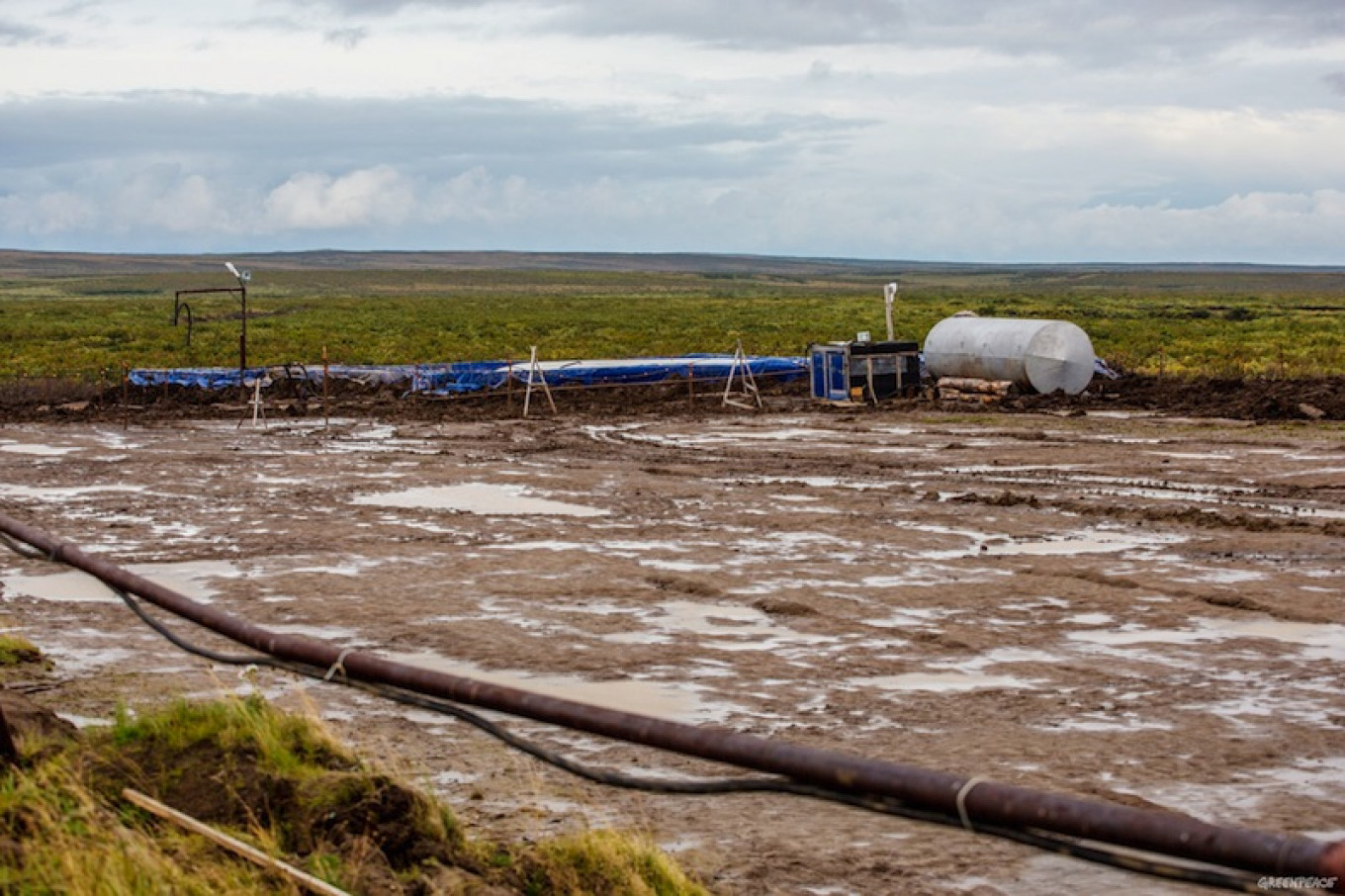 
					“IOC was storing oil products in plastic containers dangerously close to the Yenisei River,” recalls Konstantin Fomin, the Greenpeace spokesman.					 					Greenpeace				