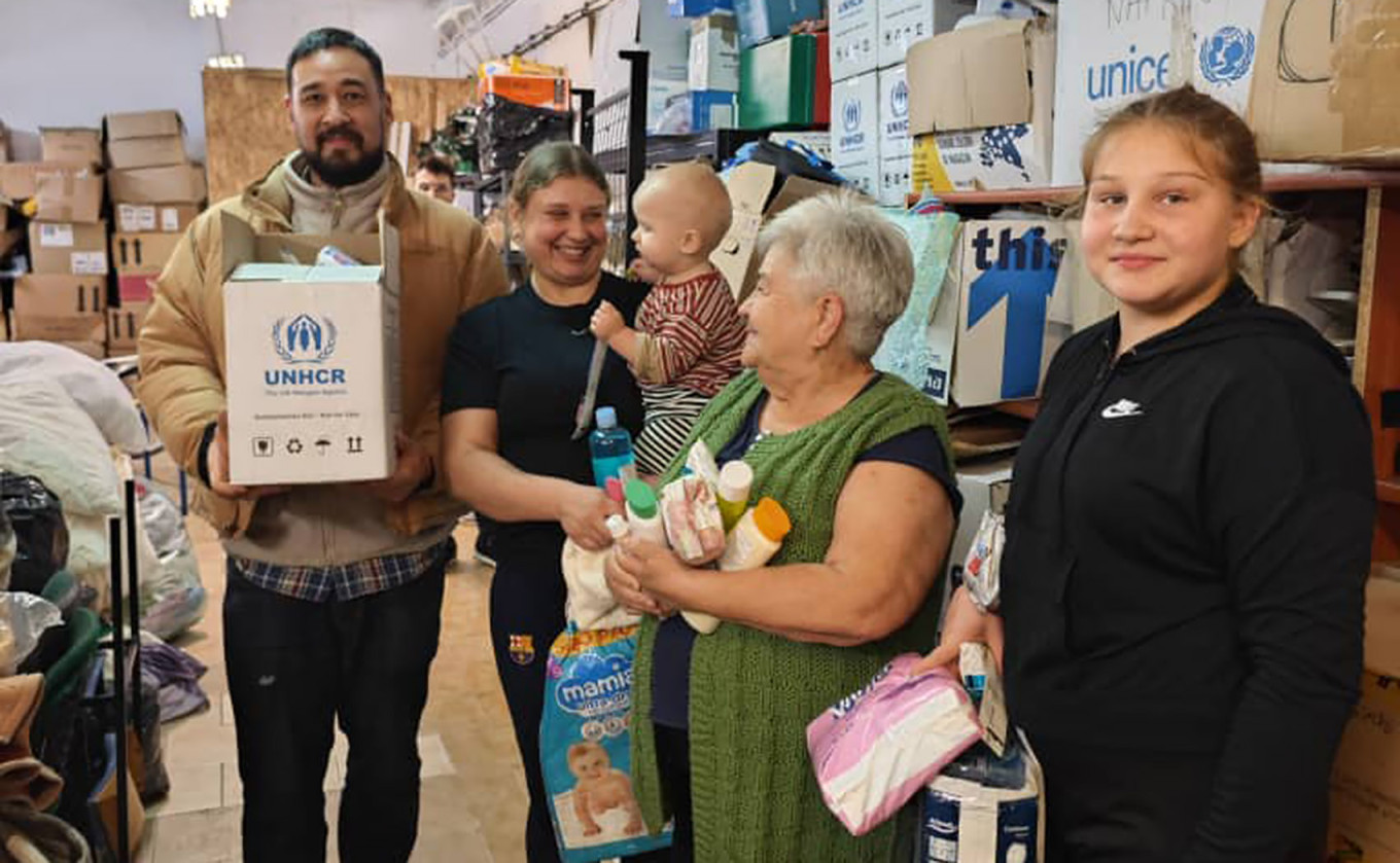 
					A family receiving supplies at Hope Shelter in Przemysl, Poland.					 					Courtesy photo				