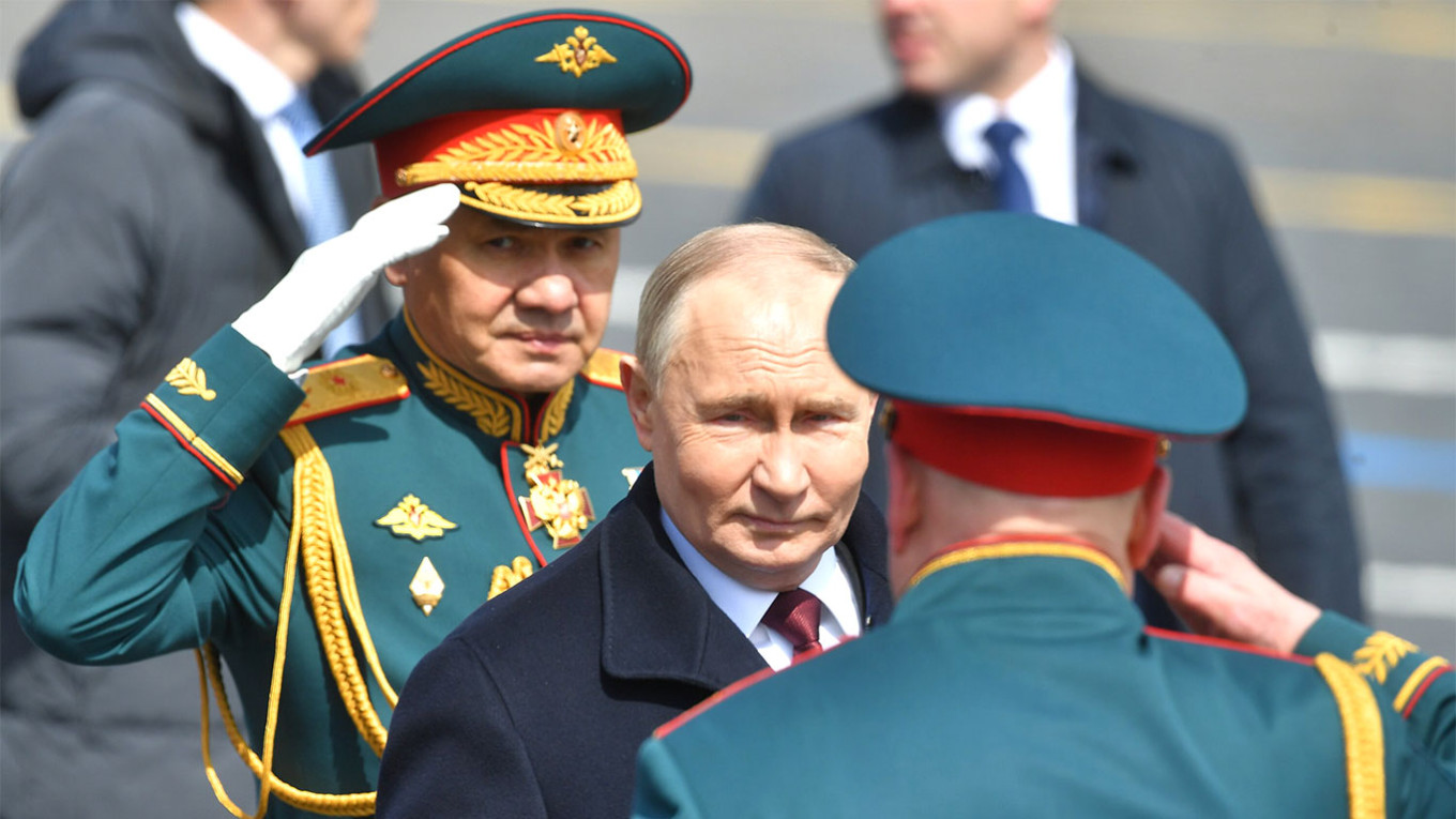
					Vladimir Putin and Sergei Shoigu at the military parade on May 9.					 					Sergei Kiselev / Moskva News Agency				