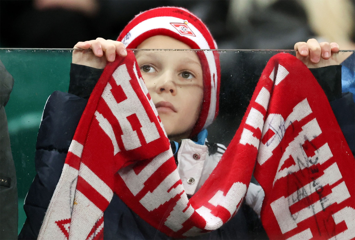 
					A young Spartak Moscow fan attends a recent match in Moscow. 					 					Anton Novoderezhkin / TASS				