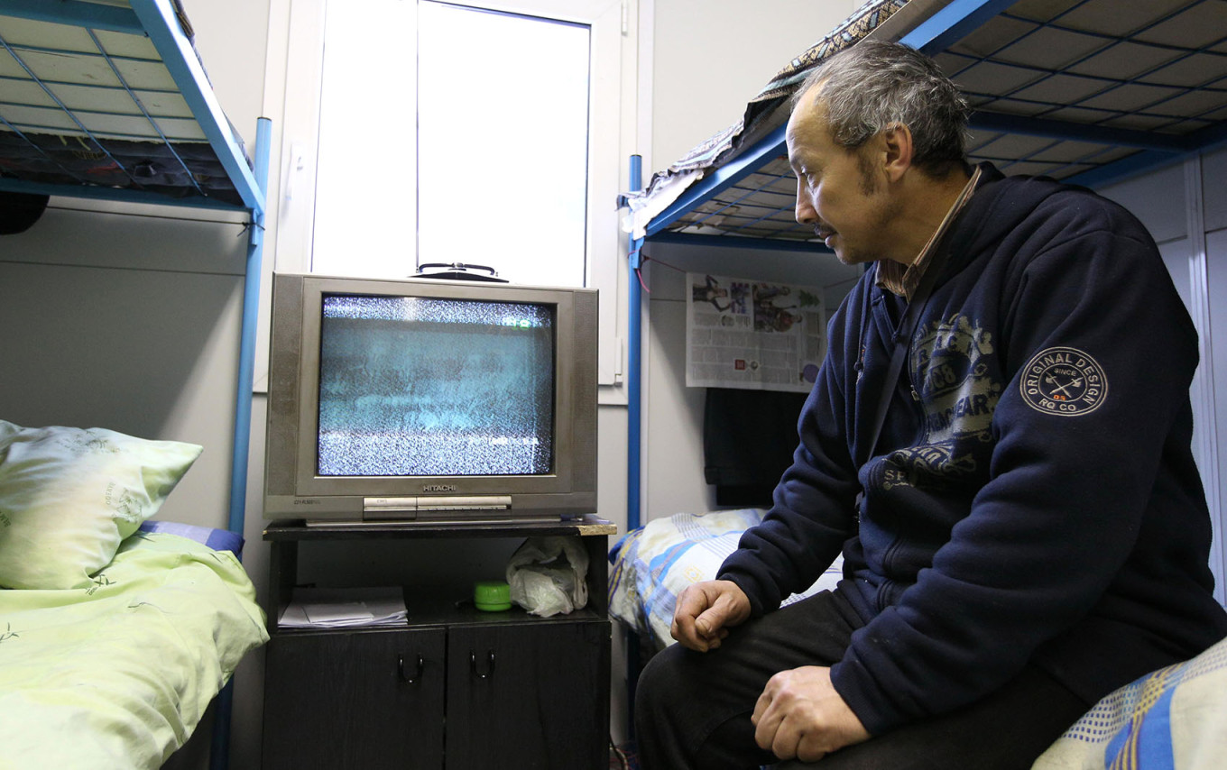 
					Migrant worker in Moscow.					 					Moskva News Agency				