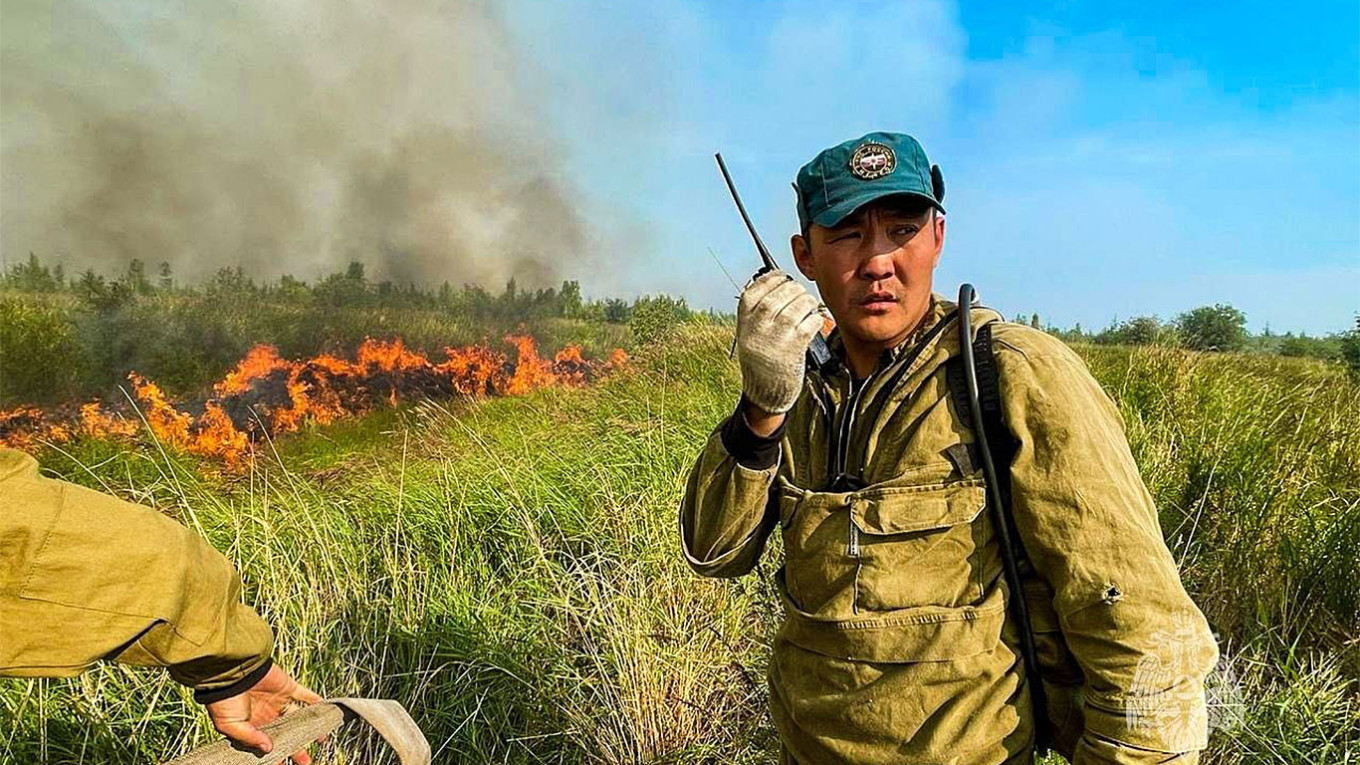 
					Extinguishing wildfires in the republic of Sakha in far northeast Siberia, a region that has been hard-hit by wildfires over the past five years.					 					Russian Emergencies Ministry				