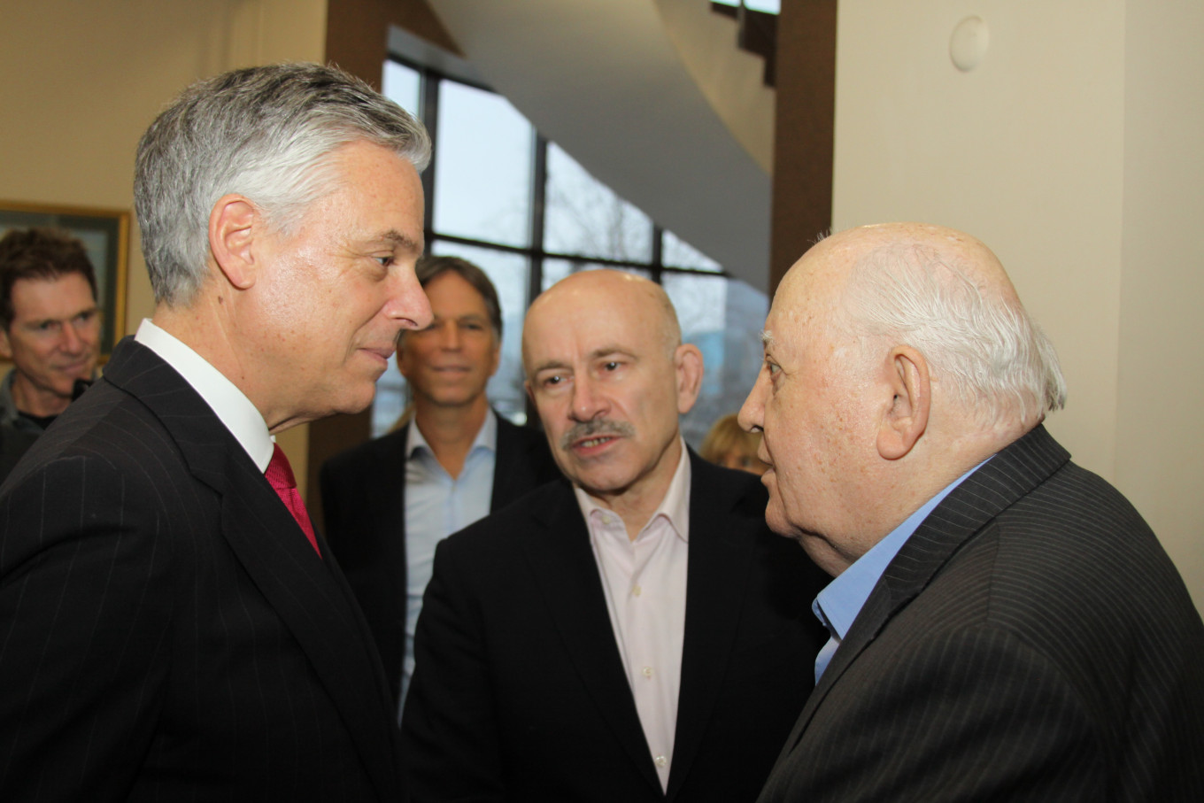 
				U.S. Ambassador John Huntsman meets with Mikhail Gorbachev as Pavel Palazhchenko, center, interprets. 				 				MT			
