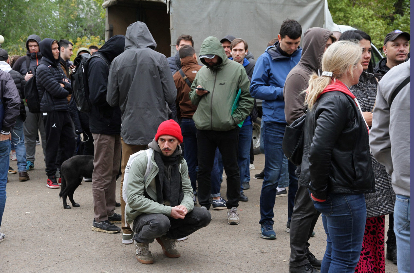 
					Russian citizens line up outside a public service center to receive an individual identification number for foreigners in the city of Oral (Uralsk), Kazakhstan, on Sept. 28, 2022.					 					AFP				