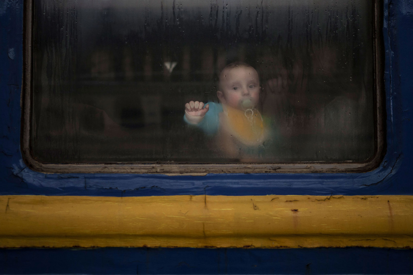 In Photos: Ukrainians Flee to Europe as War Rages