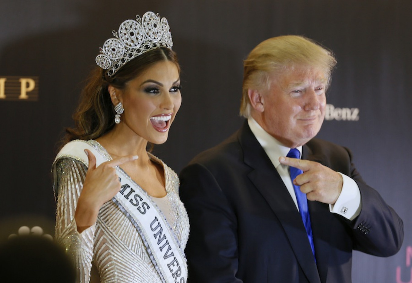 
					Miss Universe 2013 Gabriela Isler and Donald Trump while posing for a photo after the 2013 Miss Universe pageant in Moscow, Russia, Nov. 9, 2013.					 					Ivan Sekretarev / AP				