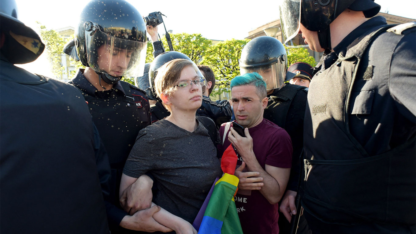 
					Russian riot police detained gay rights activist during World Day Against Homophobia and Transophobia in Saint Petersburg in 2019.					 					Olga Maltseva / AFP				