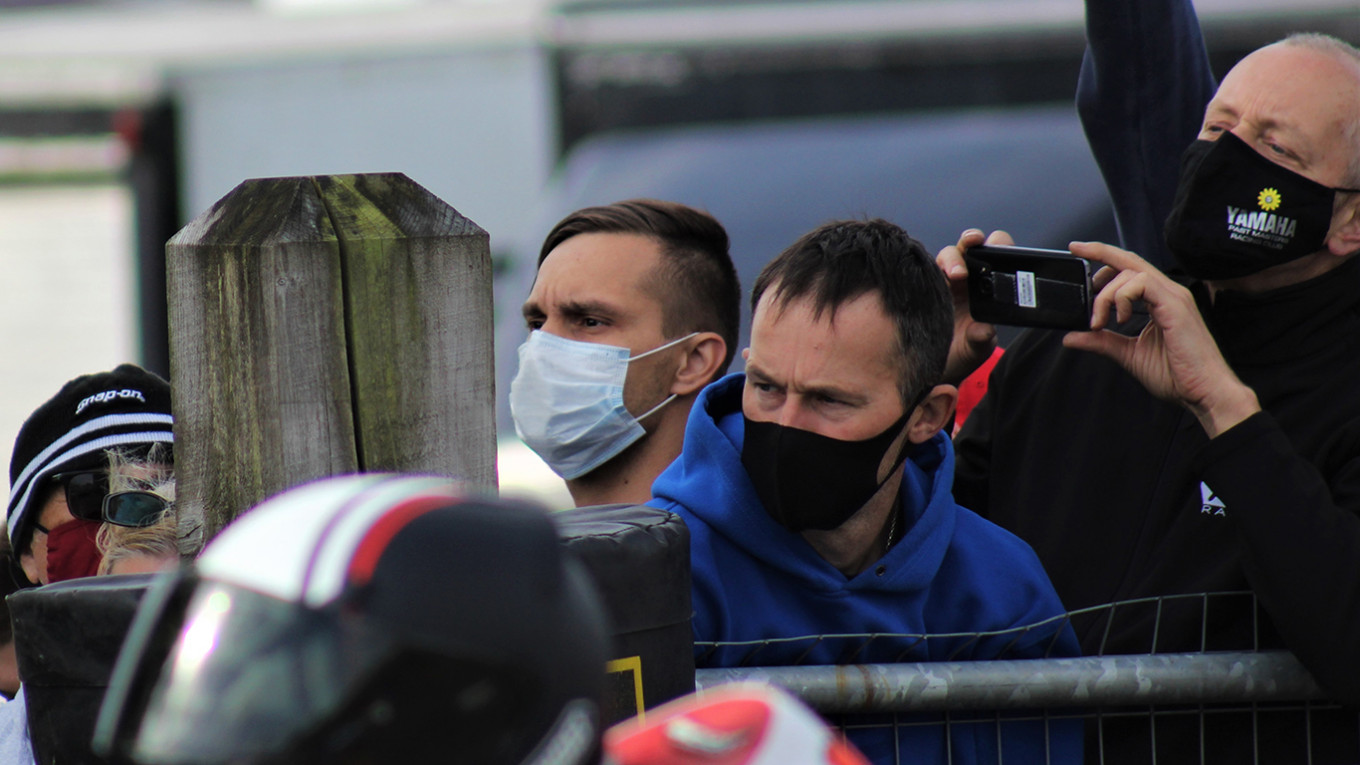 
					Krasniuk watches the racing as he awaits his start.					 					Ben McCook / MT				