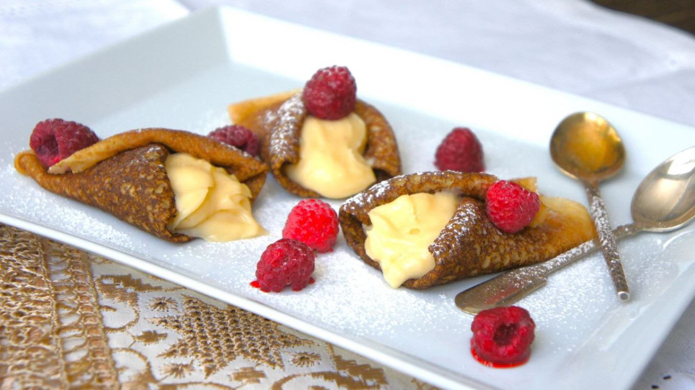 
					Delicate milk blinis filled with crème brûlée					 					Pavel and Olga Syutkin				